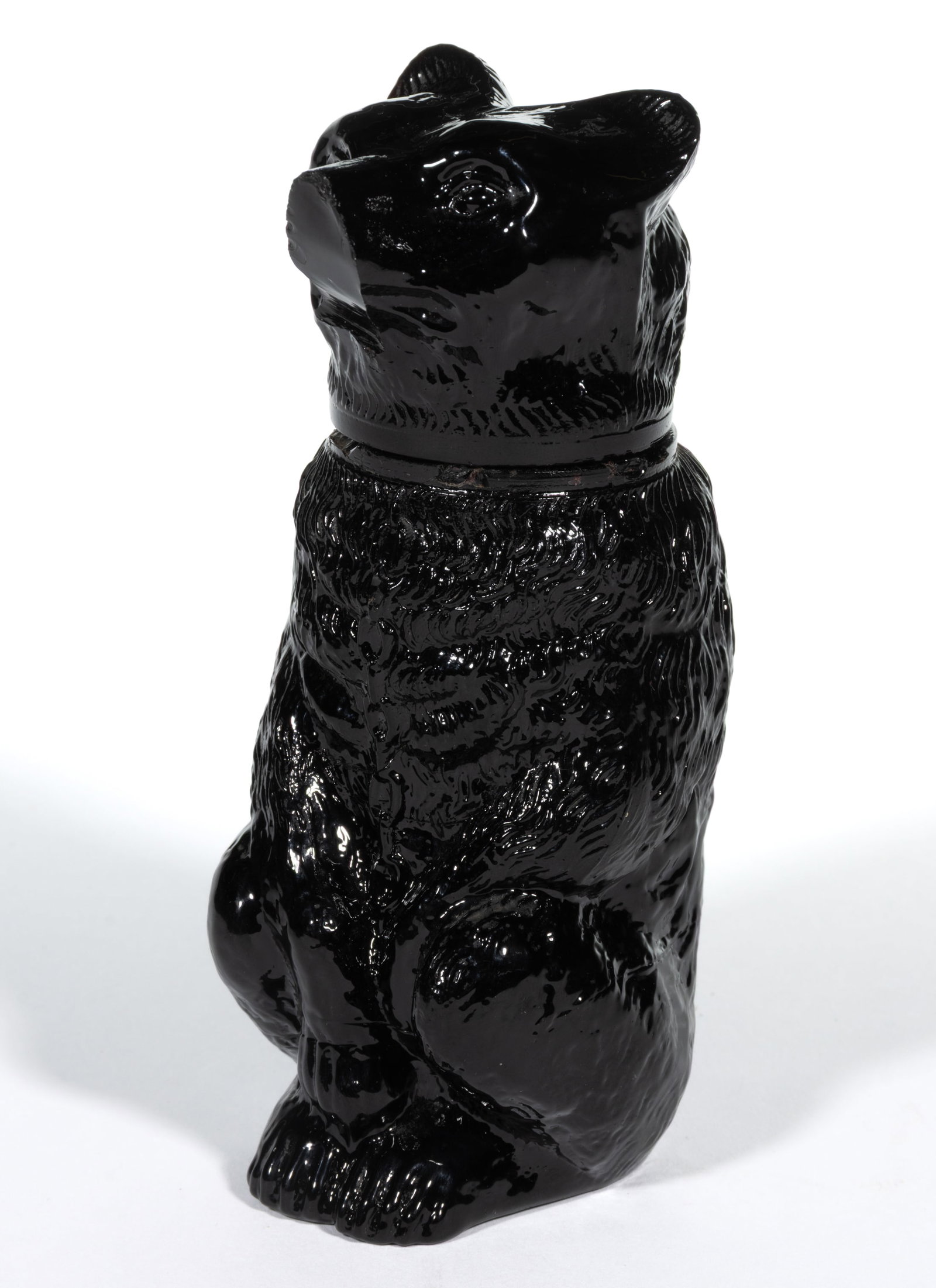 PRESSED CHAINED BEAR LARGE-SIZE JAR: PRESSED CHAINED BEAR LARGE-SIZE JAR, opaque black, embossed "X. BAZIN / PHILIA" under base. Boston & Sandwich Glass Co. 1850-1870. 5 3/4" HOA, 1 3/4" D rim. Literature: