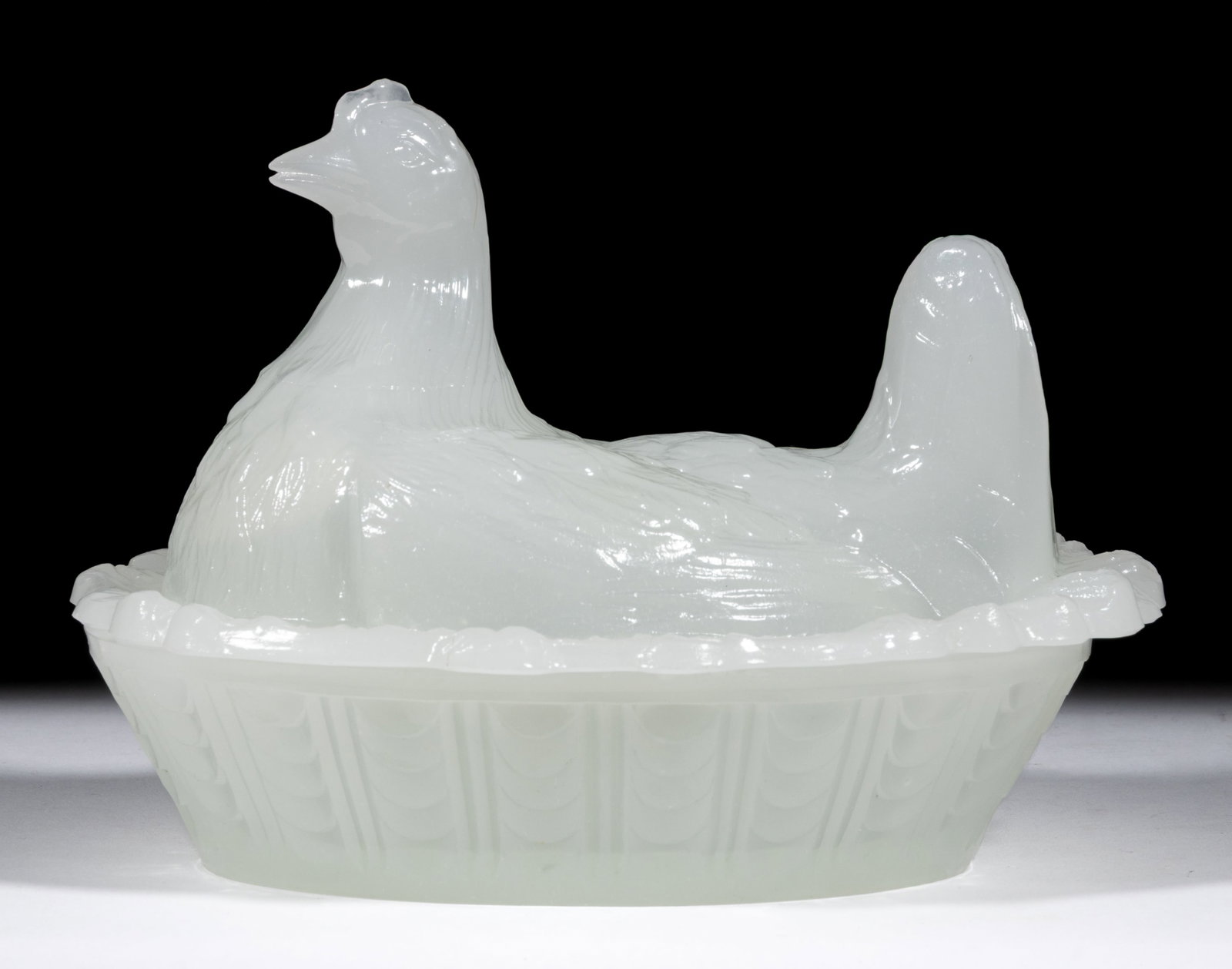 PRESSED SANDWICH HEN COVERED DISH: PRESSED SANDWICH HEN COVERED DISH, alabaster/clambroth with a shiny surface, cover with a complex molded-straw rim, dish with drape-panel sides and a waffle-pattern base. Boston & Sandwich Glass C