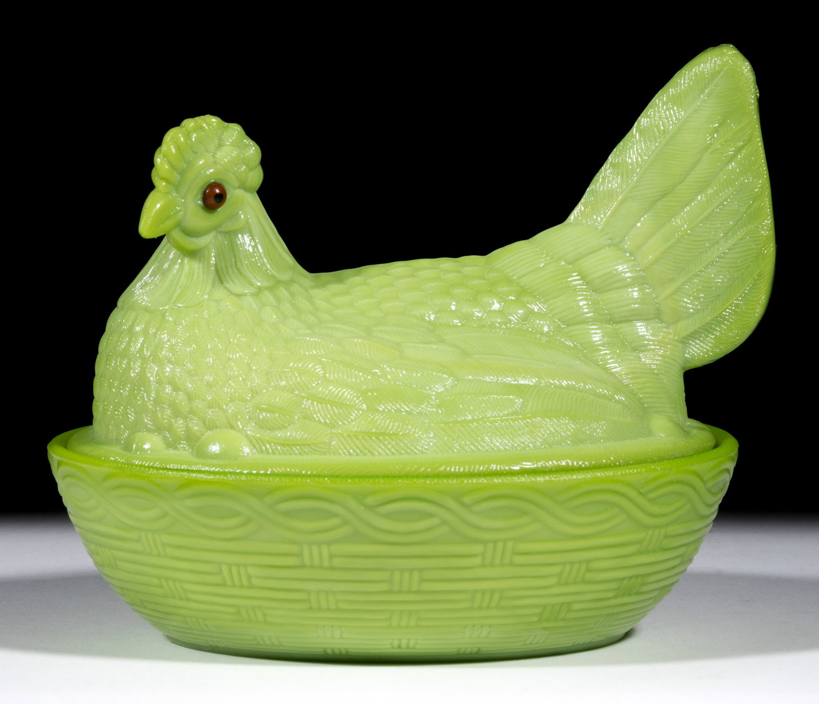 CHALLINOR HEN ON NEST COVERED DISH: CHALLINOR HEN ON NEST COVERED DISH, Nile Green, with applied eyes and basketweave base. Challinor, Taylor & Co. Fourth quarter 19th century. 6" HOA, 5 1/2" x 7" base rim. Liter