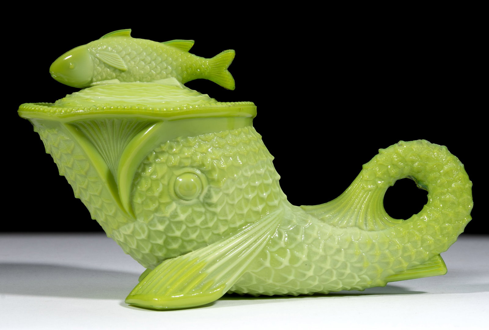 GREENTOWN DOLPHIN COVERED DISH: GREENTOWN DOLPHIN COVERED DISH, Nile Green, with beaded rim. Indiana Tumbler & Goblet Co., Greentown, IN. Circa 1902. 4 3/8" HOA, 7" LOA. Literature: Parallels NGGA/Measell (e