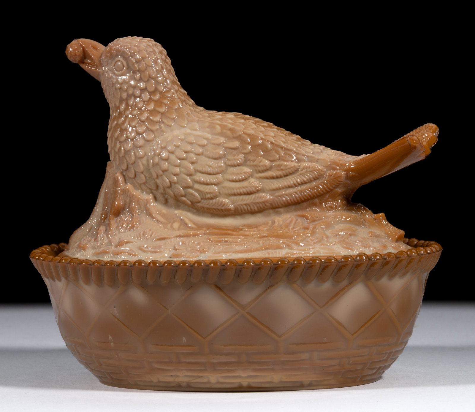 GREENTOWN BIRD WITH BERRY COVERED DISH: GREENTOWN BIRD WITH BERRY COVERED DISH, chocolate, diamond and basketweave base. Indiana Tumbler and Goblet Co. Late 19th/early 20th century. 4 3/4" HOA, 4 1/4" x 5 1/2" base. Lit