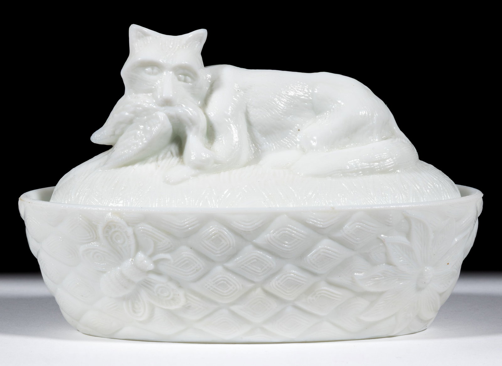 FLACCUS FOX AND GOOSE COVERED DISH: FLACCUS FOX AND GOOSE COVERED DISH, opaque white/milk glass, original base. Fourth quarter 19th century. 4 1/4" HOA, 3 1/2" x 6 1/8". Literature: Parallels the Fersons - Yest
