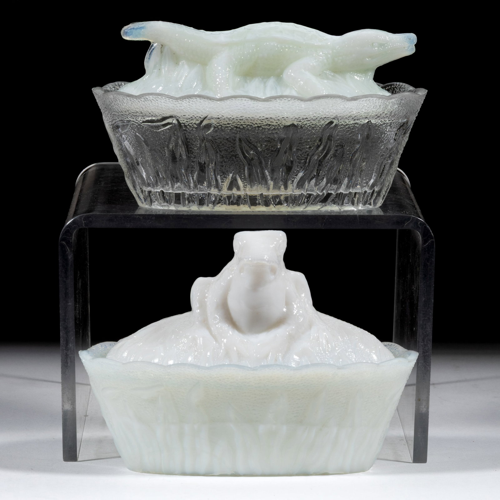 FIGURAL ANIMAL COVERED DISHES, LOT OF TWO: FIGURAL ANIMAL COVERED DISHES, LOT OF TWO, oval dishes, comprising an opaque white/milk glass covered dish featuring a frog on a rush base and an opaque white/milk glass cover featuring an