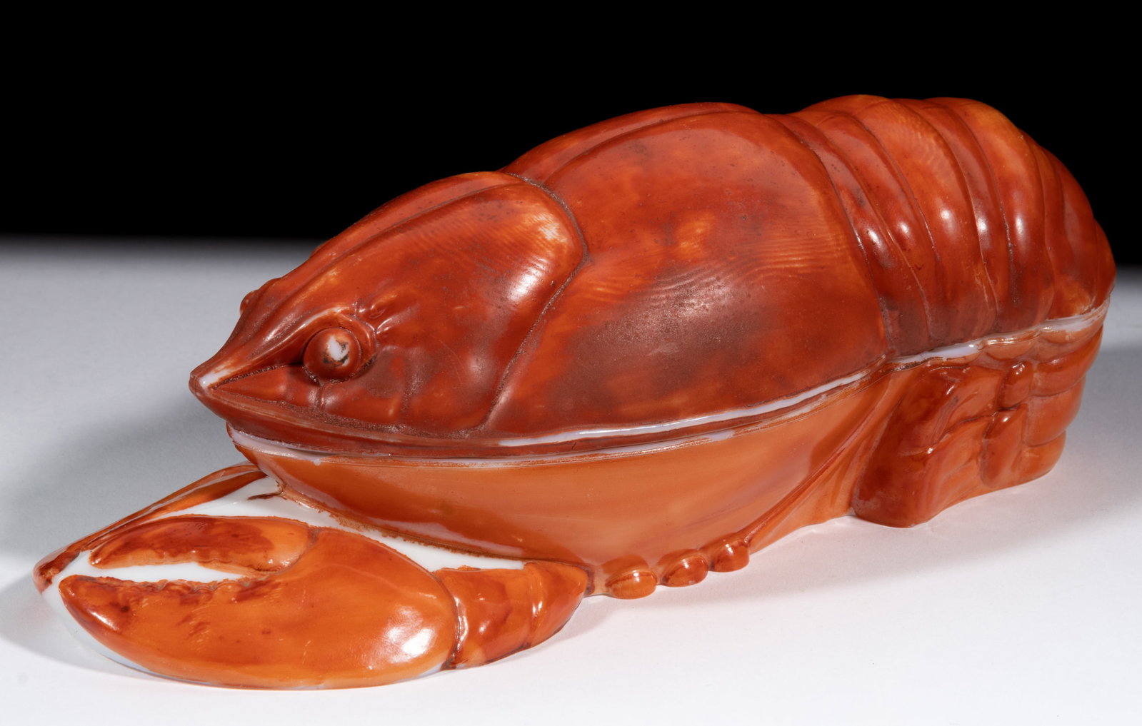 LOBSTER COVERED DISH: LOBSTER COVERED DISH, opaque white/milk glass with original paint decoration, elaborate detail. Fourth quarter 19th century. 3 1/8" H, 3 1/2" x 8 5/8". Literature: Parallels 