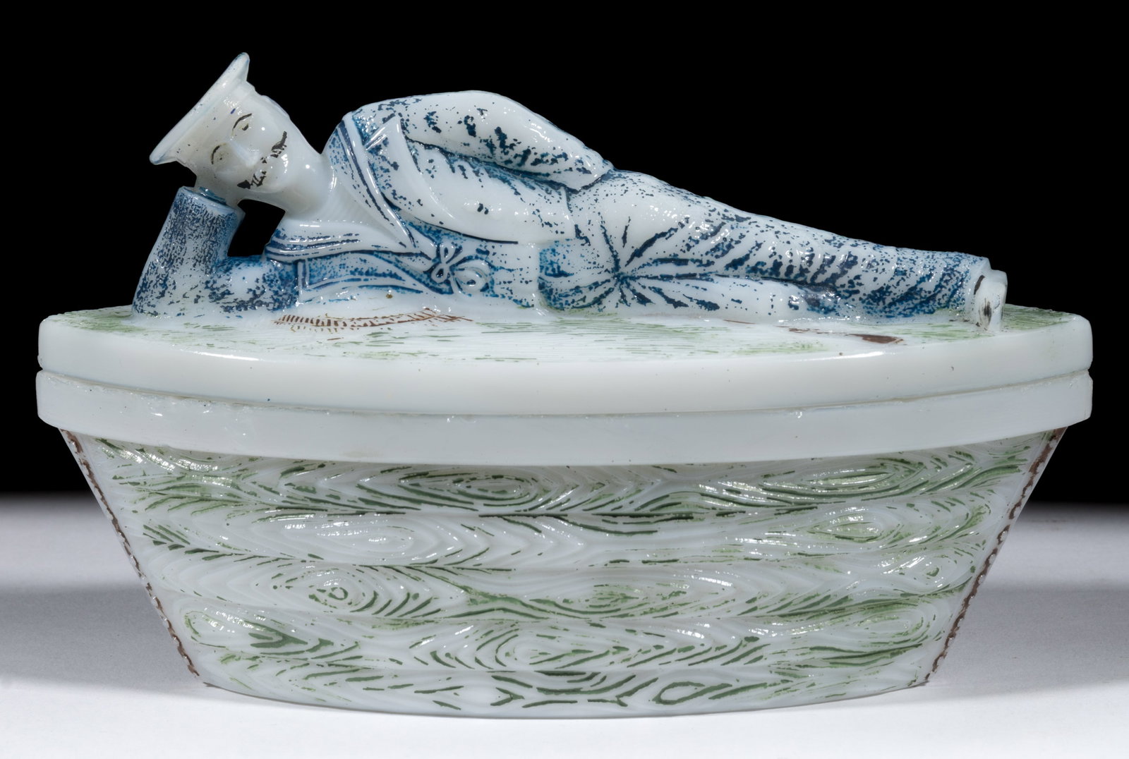 SAILOR ON BOAT MUSTARD JAR: SAILOR ON BOAT MUSTARD JAR, opaque white/milk glass with original paint decoration. August Walther & Solme. Circa 1904. 4 3/8" HOA, 3 1/4" WOA, 7 1/8" LOA. Published: