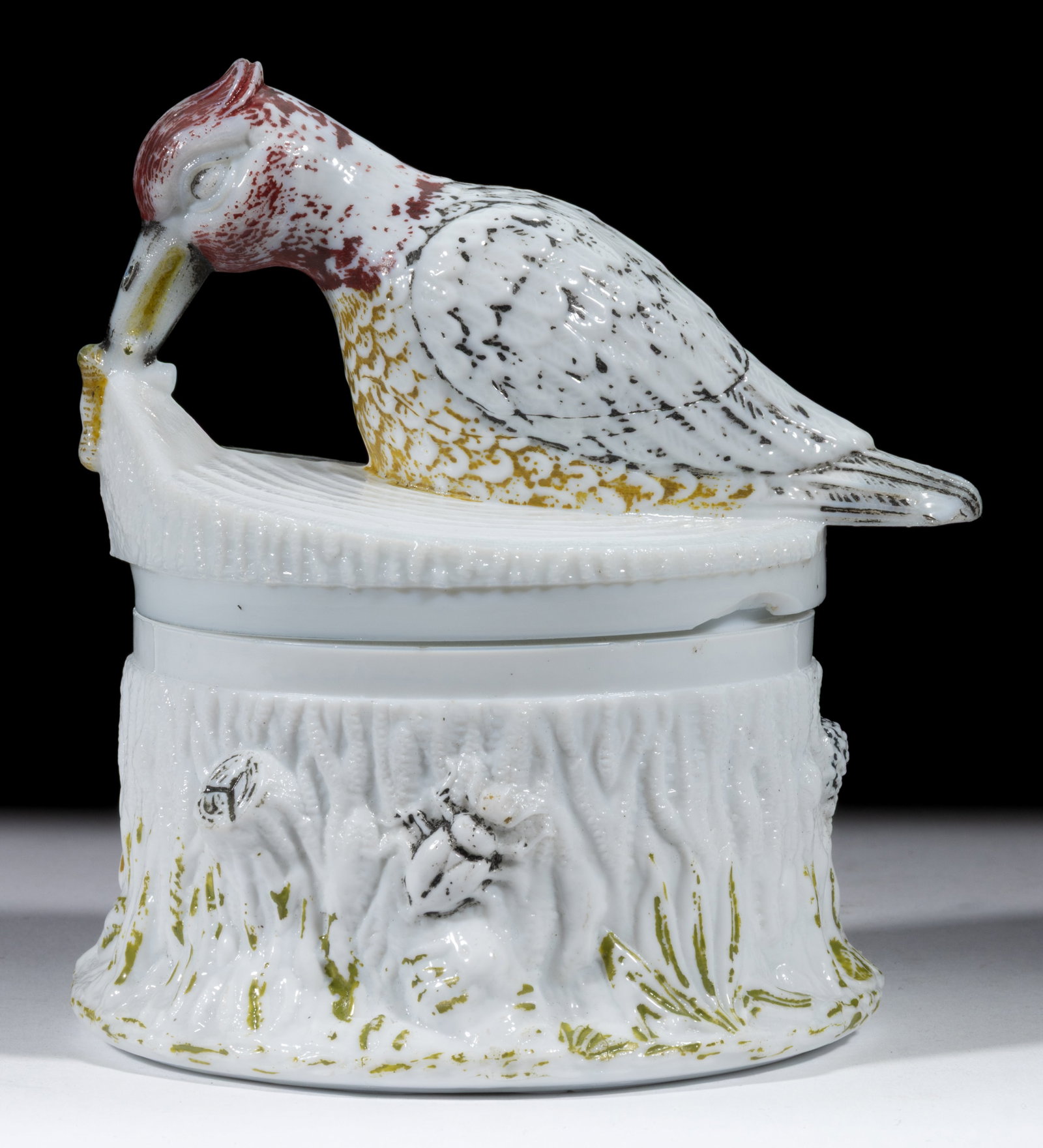 WOODPECKER COVERED DISH: WOODPECKER COVERED DISH, opaque white/milk glass with original paint decoration. Continental. Fourth quarter 19th/first quarter 20th century. 5 7/8" HOA, 4 7/8" D base. Published: Chiar