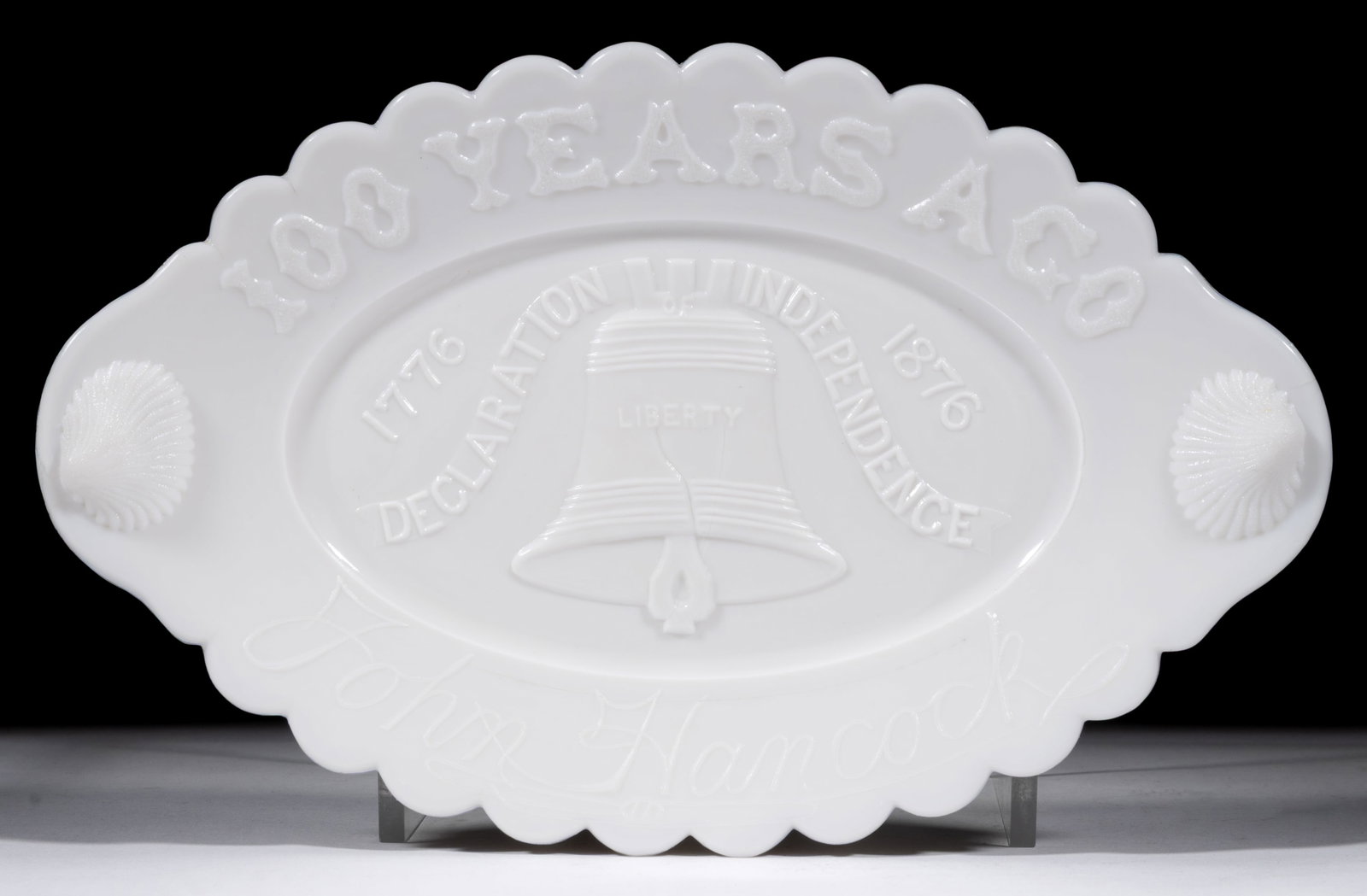 CENTENNIAL JOHN HANCOCK / LIBERTY BELL PLATTER / TRAY: CENTENNIAL JOHN HANCOCK / LIBERTY BELL PLATTER / TRAY, opaque white/milk glass, small size with shell tabs/handles, each embossed, "100 YEARS AGO / DECLARATION OF INDEPENDENCE / JOHN HA