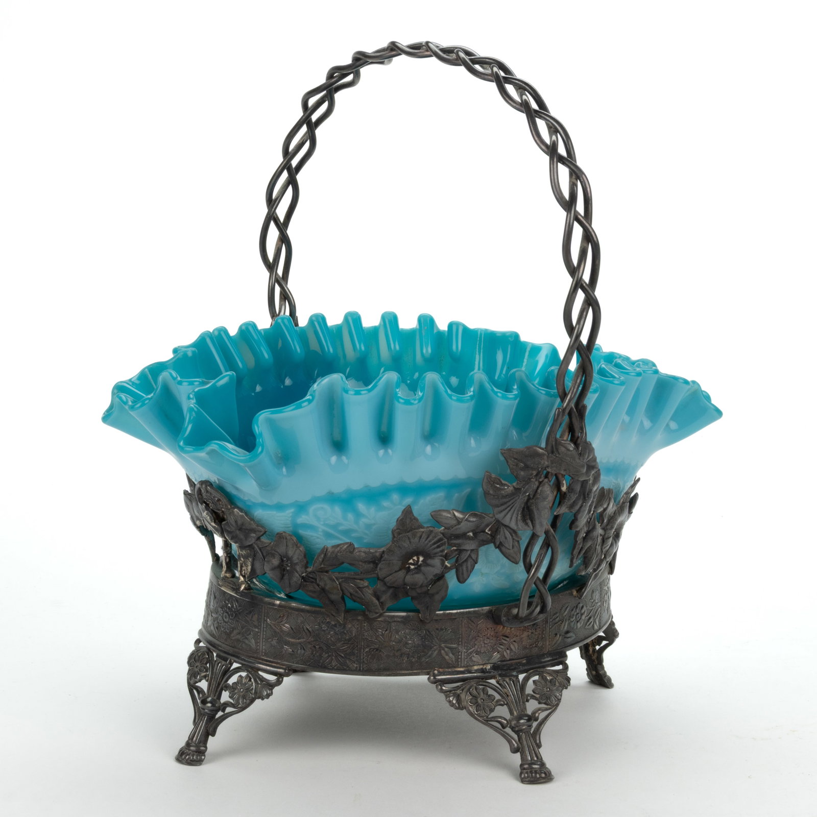 MT. WASHINGTON CAMEO BRIDE'S BASKET: MT. WASHINGTON CAMEO BRIDE'S BASKET, light blue cut to medium blue, depicting griffins and floral decoration, ruffled rim, ground pontil mark, fitted in a quadruple-plated stand marked for "H