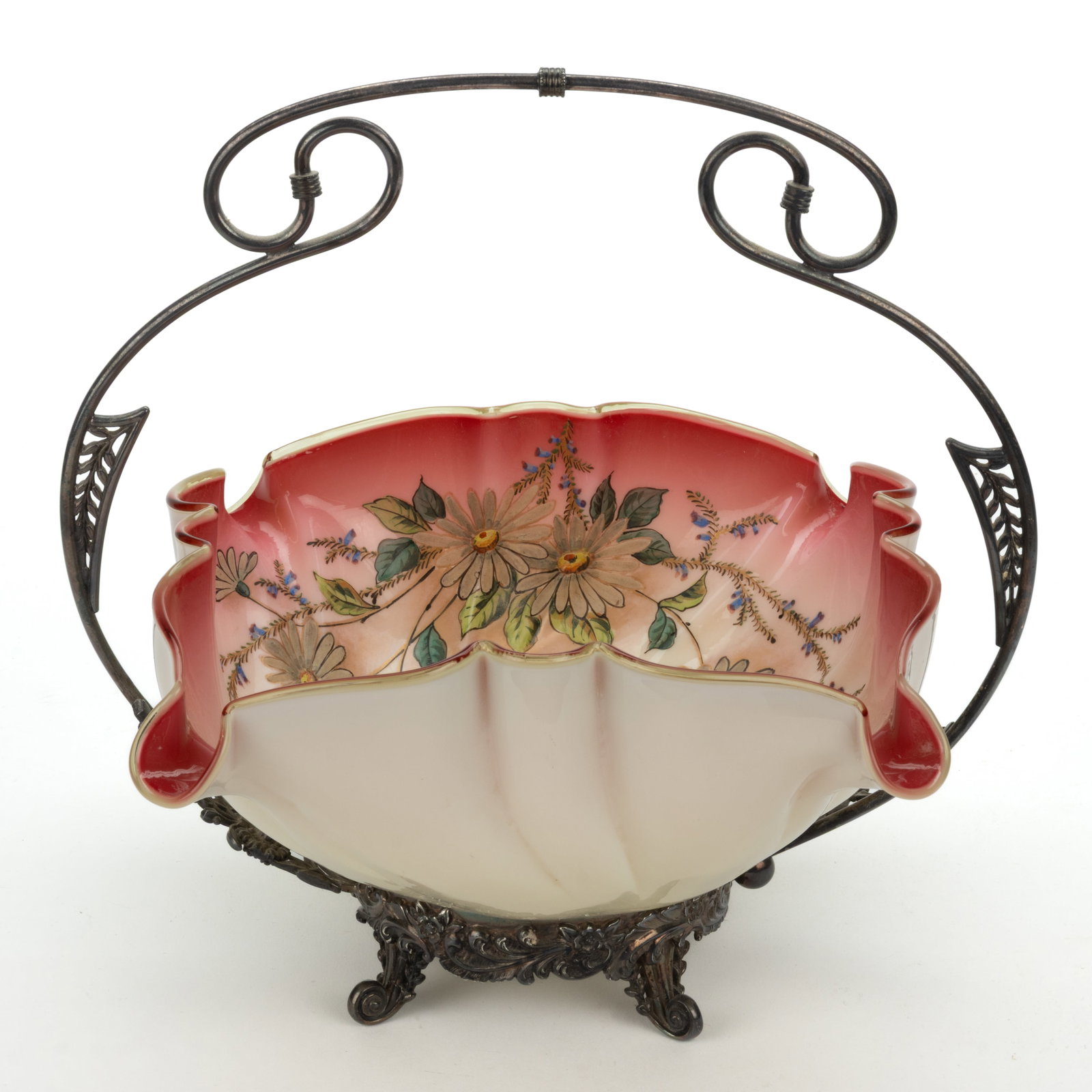 VICTORIAN CASED GLASS BRIDE'S BASKET: VICTORIAN CASED GLASS BRIDE'S BASKET, glossy opaque rose shaded to white cased custard (reacts under black light), ruffled rim square form with interior polychrome-enamel and gilt f