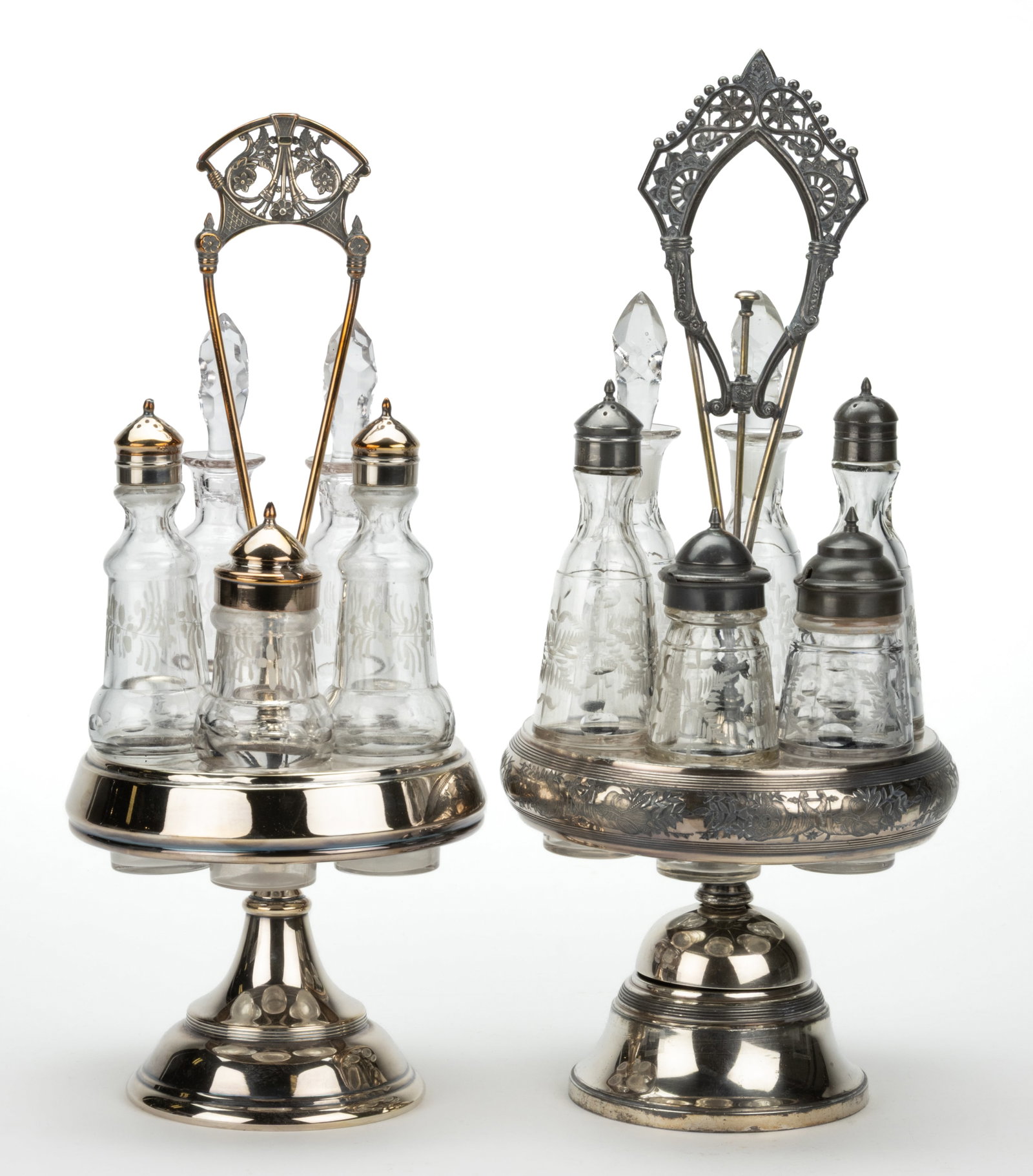 ENGRAVED GLASS CASTER SETS, LOT OF TWO: ENGRAVED GLASS CASTER SETS, LOT OF TWO, colorless, comprising a six-bottle set with a salt and pepper shaker with two-par lid, two mustards, and two oil bottles fitted into a quadruple-plated sta