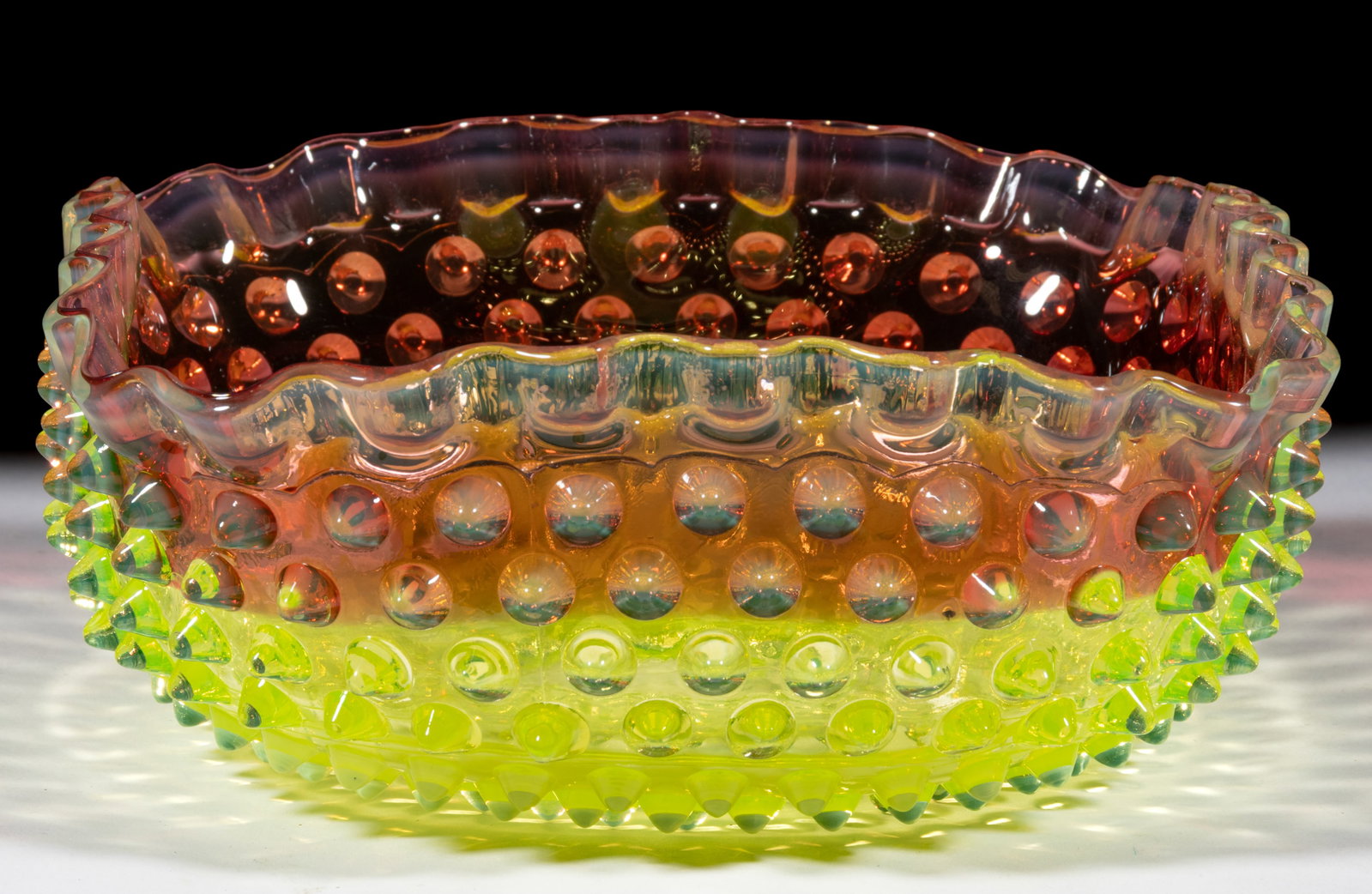 HOBBS NO. 323 DEW DROP / HOBNAIL BRIDE'S BASKET: HOBBS NO. 323 DEW DROP / HOBNAIL BRIDE'S BASKET, rubina verde (reacts under black light), square form, ruffled-rim and polished pontil mark. Hobbs, Brockunier & Co. Introduced in 188