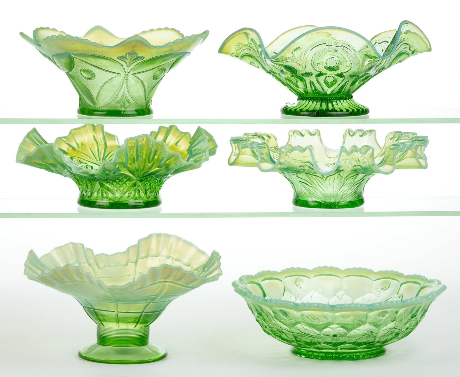 ASSORTED OPALESCENT GLASS BOWLS, LOT OF SIX: ASSORTED OPALESCENT GLASS BOWLS, LOT OF SIX, green opalescent, including a Fenton Honeycomb and Clover, a Dugan Keyhole, a Reflecting Diamonds, a Jefferson Block, a Wheel and Block, and a Wilted Flowe