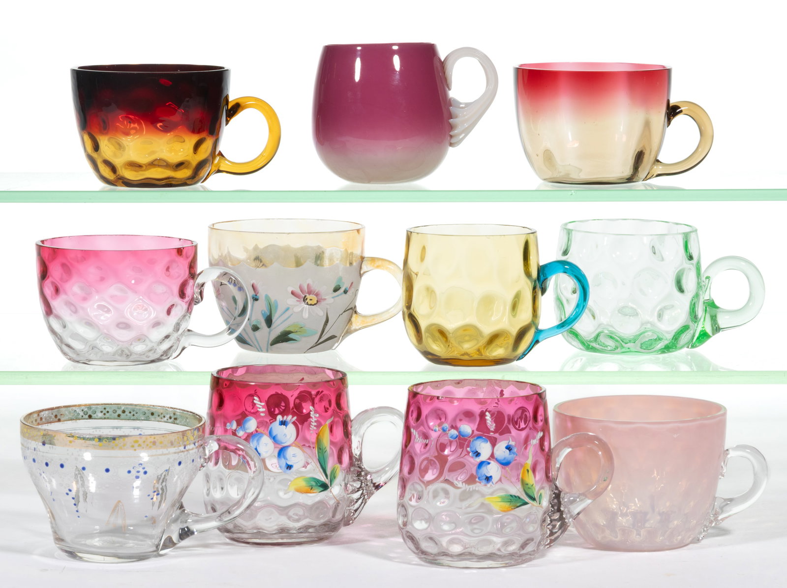 ASSORTED VICTORIAN GLASS PUNCH CUPS, LOT OF 11: ASSORTED VICTORIAN GLASS PUNCH CUPS, LOT OF 11, including a dew drop optic with amber glass and deep ruby amberina, two polka-dot optics, one with amber with blue handle and apple green (reacts u