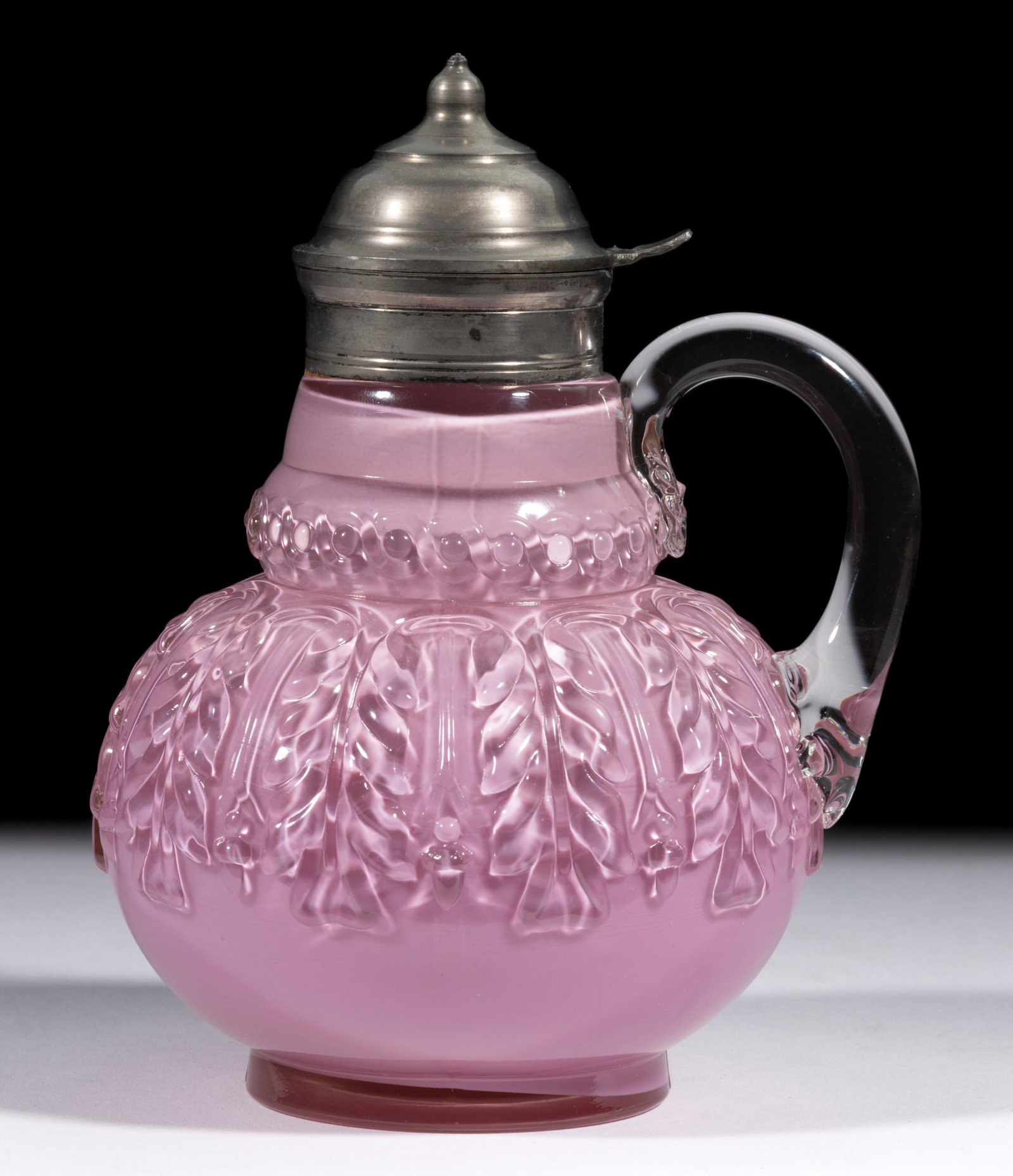 NORTHWOOD NO. 263 / LEAF UMBRELLA SYRUP PITCHER: NORTHWOOD NO. 263 / LEAF UMBRELLA SYRUP PITCHER, Rose Du Barry, applied colorless handle, period lid. H. Northwood Glass Co. Pattern introduced in 1889. 6 5/8" HOA. Literature: Heacock/Measell/Wi