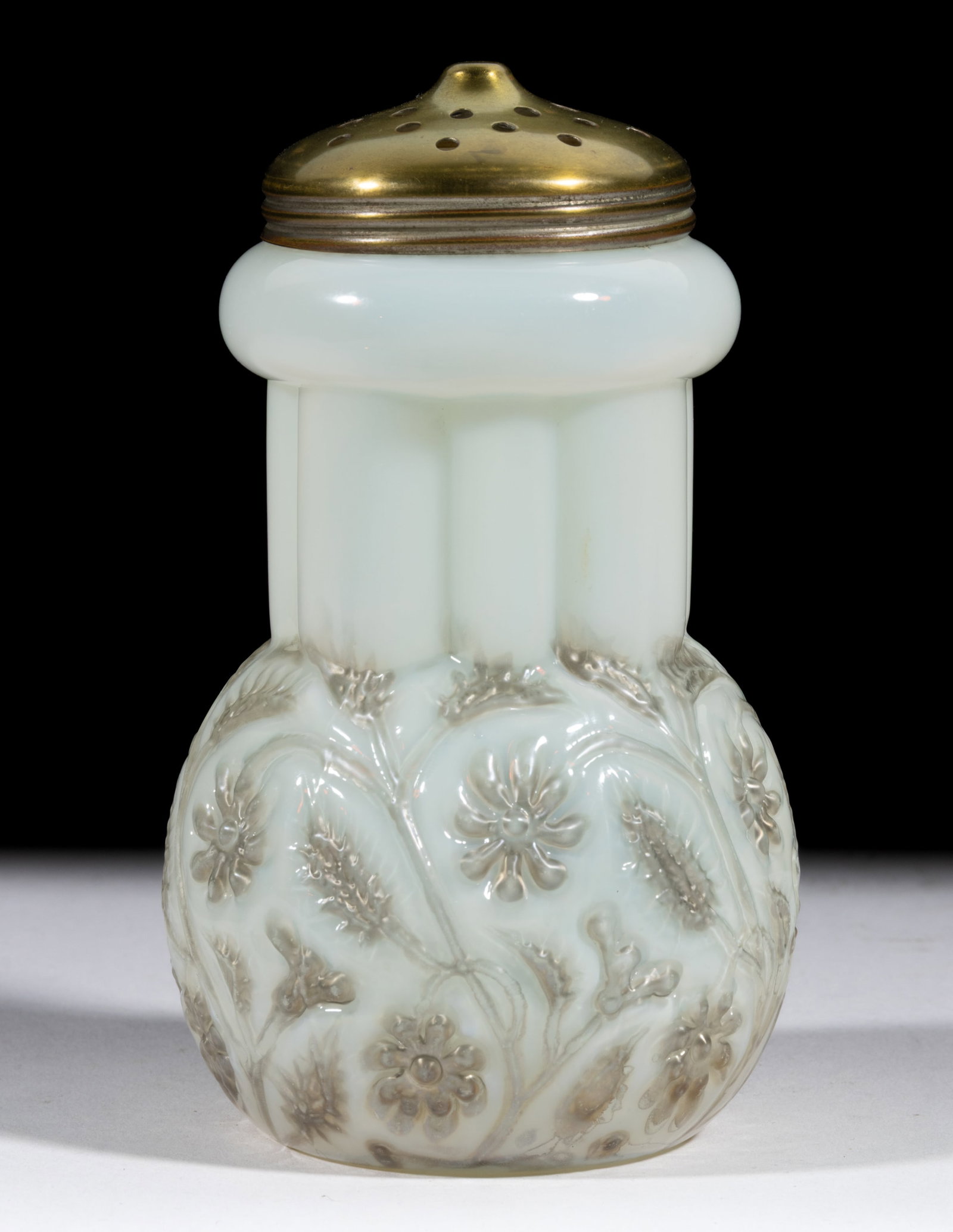 FINDLAY ONYX SUGAR SHAKER: FINDLAY ONYX SUGAR SHAKER, ivory onyx, with platinum flowers, period lid. Dalzell, Gilmore & Leighton Co., Findlay, OH. Circa 1889. 5 1/2" H. Literature: Parallels Measell/Smith - Findlay Gla