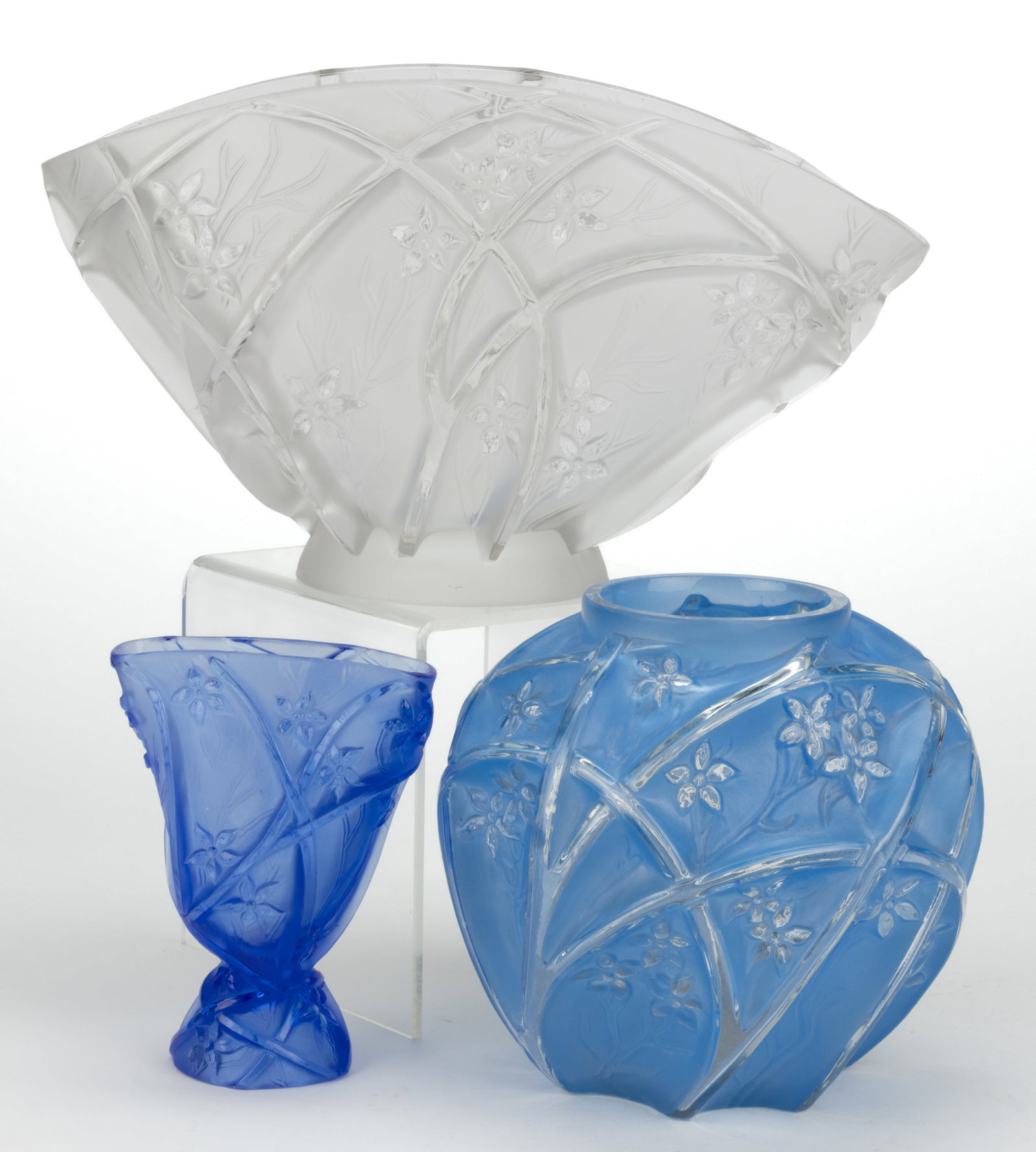 CONSOLIDATED'S LINE 700 ART GLASS ARTICLES, LOT OF THREE: CONSOLIDATED'S LINE 700 ART GLASS ARTICLES, LOT OF THREE, blue crystal, blue wash on crystal, and French crystal, comprising a fan vase, a spherical vase, and an unusual banana boat bowl