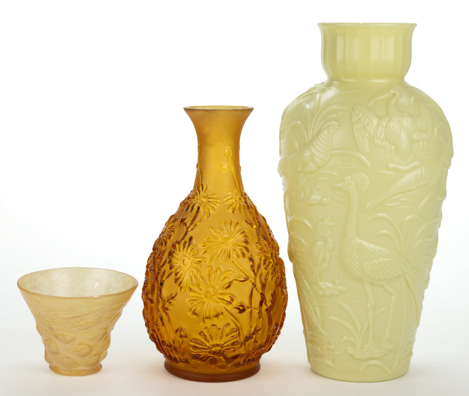 ASSORTED GLASS VASES, LOT OF THREE: ASSORTED GLASS VASES, LOT OF THREE, comprising a custard (reacts under black light) Gillinder Peacock molded vase, a frosted amber Sabino attributed vase with chrysanthemum decorat
