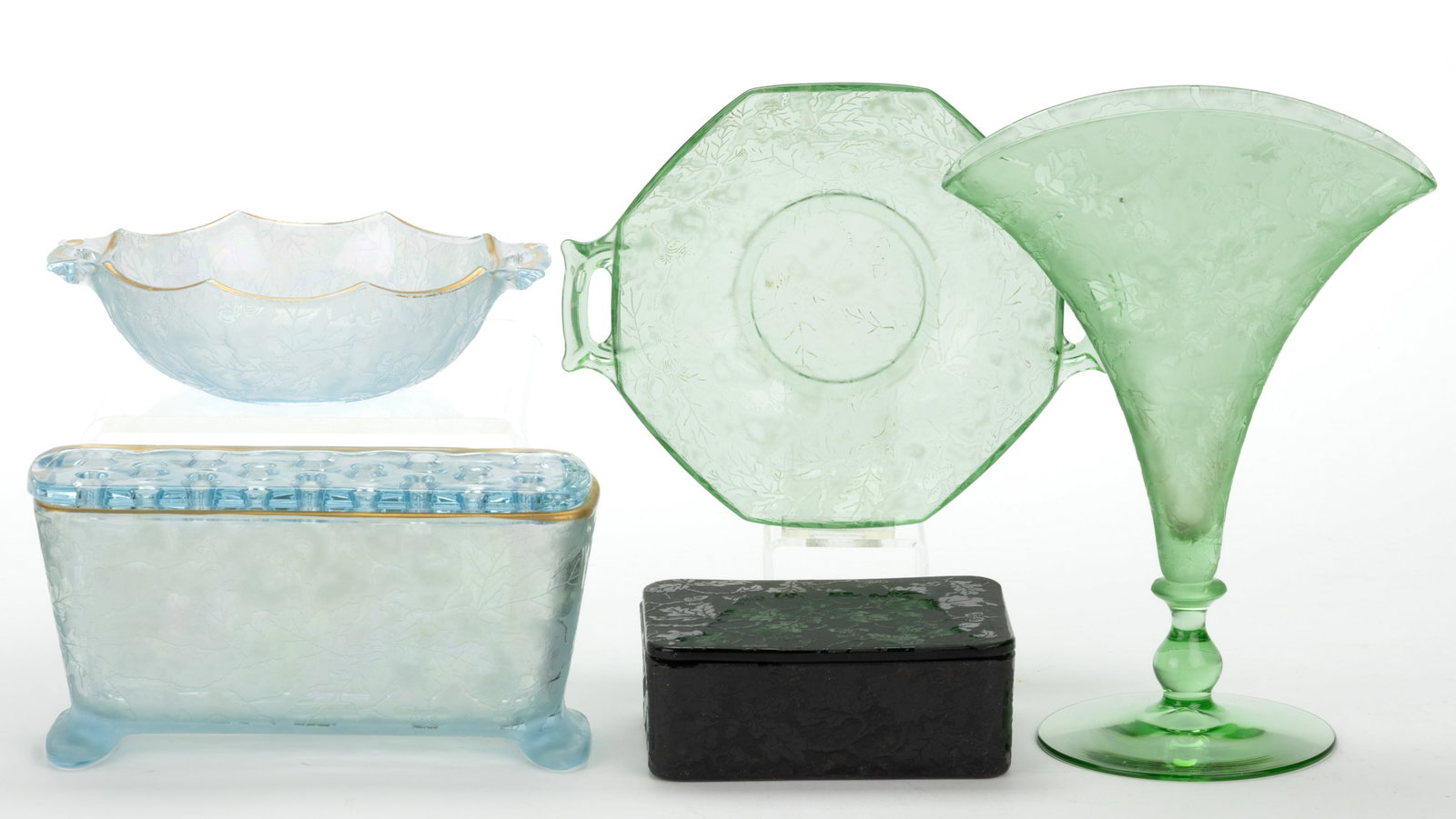 FOSTORIA OAK LEAF ETCHED GLASS ARTICLES, LOT OF FIVE: FOSTORIA OAK LEAF ETCHED GLASS ARTICLES, LOT OF FIVE, azure blue iridescent with gilt decoration, opaque amethyst black, and apple green (reacts under black light), comprising a co