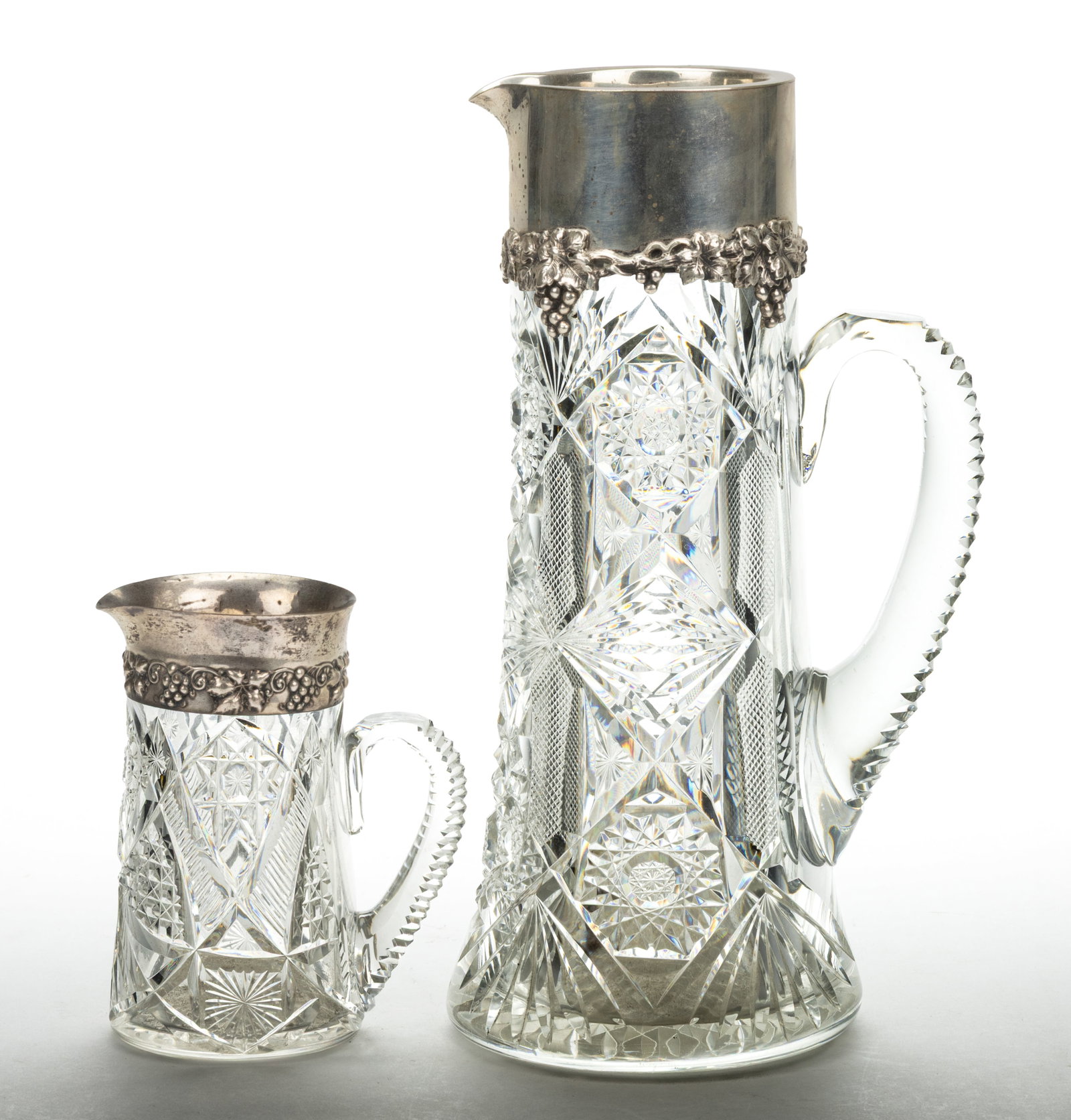 AMERICAN CUT GLASS AND STERLING SILVER PITCHERS, LOT OF TWO (1 of 1)