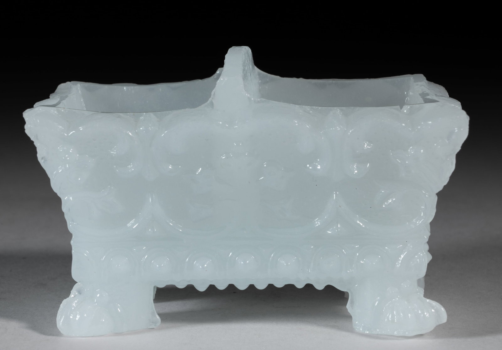 DI-3 VARIANT DIVIDED PRESSED OPEN SALT: DI-3 VARIANT DIVIDED PRESSED OPEN SALT, unlisted clambroth, scallop-and-point rim with arch-top divider, pattern variation with most of the leaves comprising three small round circles in place of the