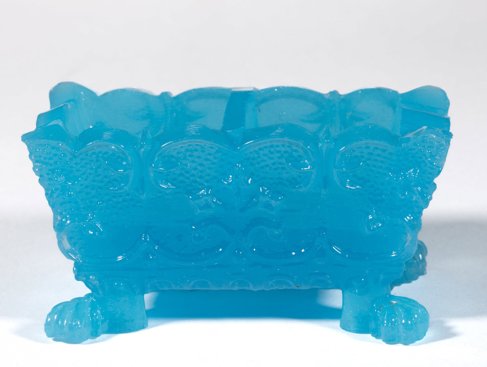DI-3 VARIANT DIVIDED PRESSED OPEN SALT: DI-3 VARIANT DIVIDED PRESSED OPEN SALT, opaque pale blue, scallop-and-point rim, raised on four extra-wide variant paw feet, probably factory-polished to the divider and rim. Extremely