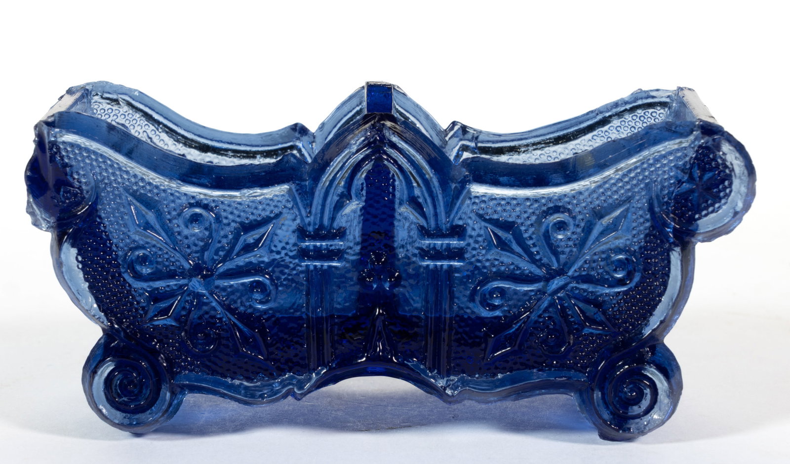 DI-11 GOTHIC ARCH DIVIDED PRESSED OPEN SALT: DI-11 GOTHIC ARCH DIVIDED PRESSED OPEN SALT, unlisted medium sapphire blue, serpentine-top divider, raised on four scrolled feet. Very or extremely rare. France. 1830-1850. 1 3/4" H, 1 3/4"