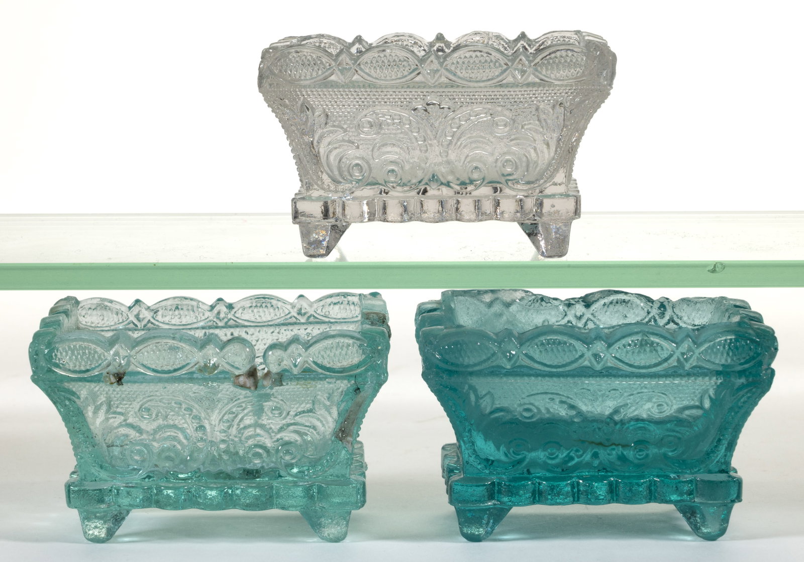 MV-1 MOUNT VERNON PRESSED OPEN SALTS, LOT OF THREE: MV-1 MOUNT VERNON PRESSED OPEN SALTS, LOT OF THREE, deep, milky aquamarine with a very thick base, aquamarine with embedded white slag, and colorless, each with a scallop-and-point rim. Plentiful, sca