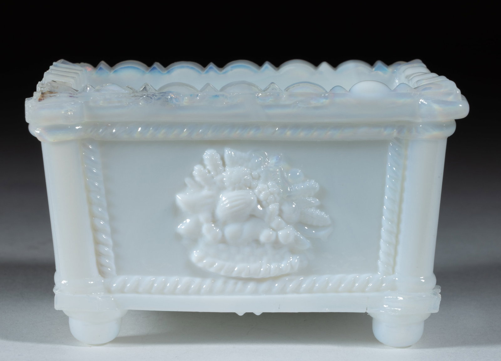 NE-1 VARIANT NEW ENGLAND MARKED PRESSED OPEN SALT: NE-1 VARIANT NEW ENGLAND MARKED PRESSED OPEN SALT, opal opaque with slight opalescence at the rim and center of the base, embossed base variation with COMPANY spelled "COMPANV" and