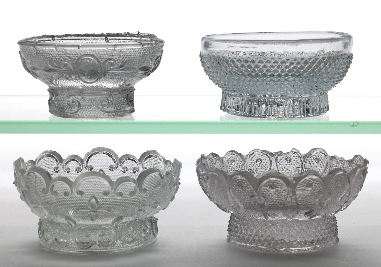 ASSORTED RD ROUND PRESSED OPEN SALTS, LOT OF FOUR (1 of 1)