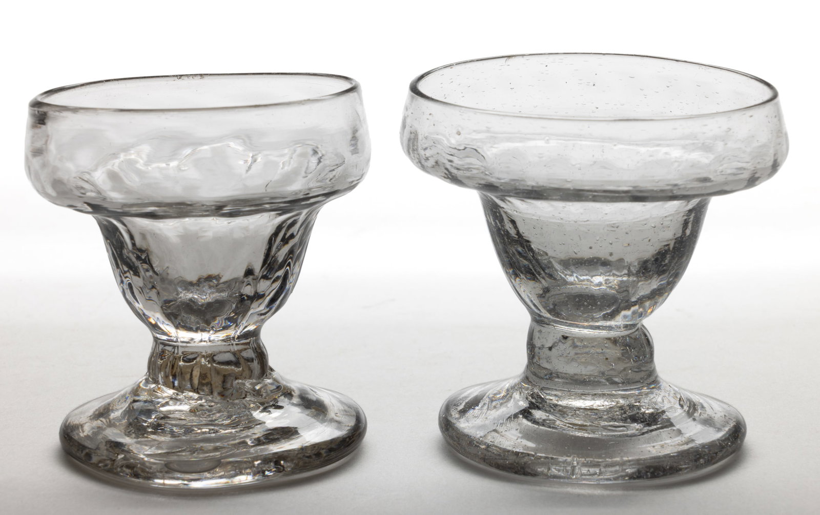 ASSORTED PATTERN-MOLDED FOOTED OPEN SALTS, LOT OF TWO (1 of 1)