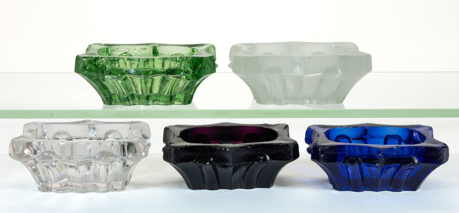 HEAVY CONCAVE PANEL AND PILLAR PRESSED OPEN SALTS, LOT OF FIVE: HEAVY CONCAVE PANEL AND PILLAR PRESSED OPEN SALTS, LOT OF FIVE, deep cobalt blue, deep amethyst, medium green, clambroth, and colorless, each with a conforming rim and base having an all-over waffle p