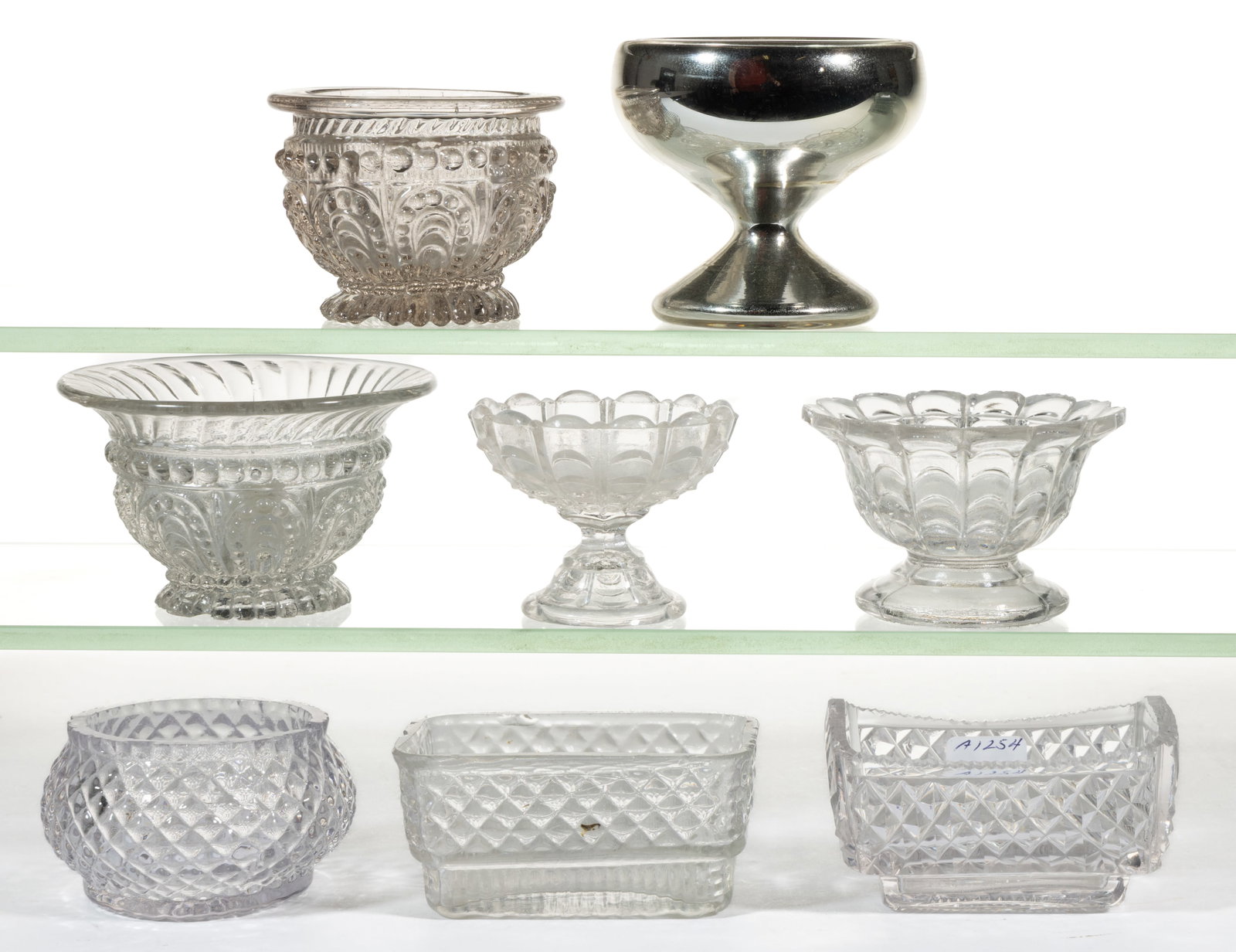 ASSORTED EARLY OPEN SALTS, LOT OF EIGHT: ASSORTED EARLY OPEN SALTS, LOT OF EIGHT, colorless, including a Mercury/silvered glass, a GV-24 round blown-molded example, and a RD-37 / MCKEARIN GV-24 variant embossed "R & G. A. WRIGHT / P