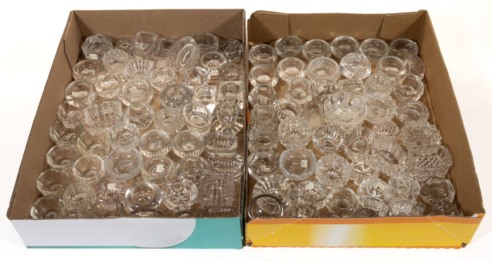 ASSORTED PRESSED GLASS OPEN SALTS, LOT OF 101 +/-: ASSORTED PRESSED GLASS OPEN SALTS, LOT OF 101 +/-, colorless, of rectangular, circular and other forms. 19th/20th century. 1/2" to 1 3/4" HOA. Provenance: From the collection of Dick an