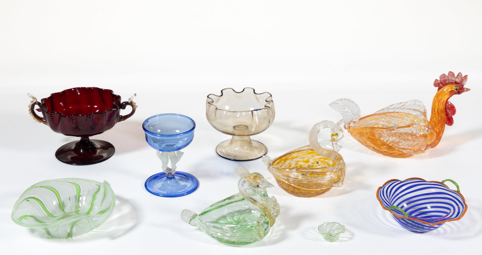 ASSORTED 20TH CENTURY GLASS OPEN SALTS, LOT OF NINE: ASSORTED 20TH CENTURY GLASS OPEN SALTS, LOT OF NINE, various colors, including a Murano rooster and two swans, a Bimini-style salt with white lampwork cat figural stem, a Murano bowl wi