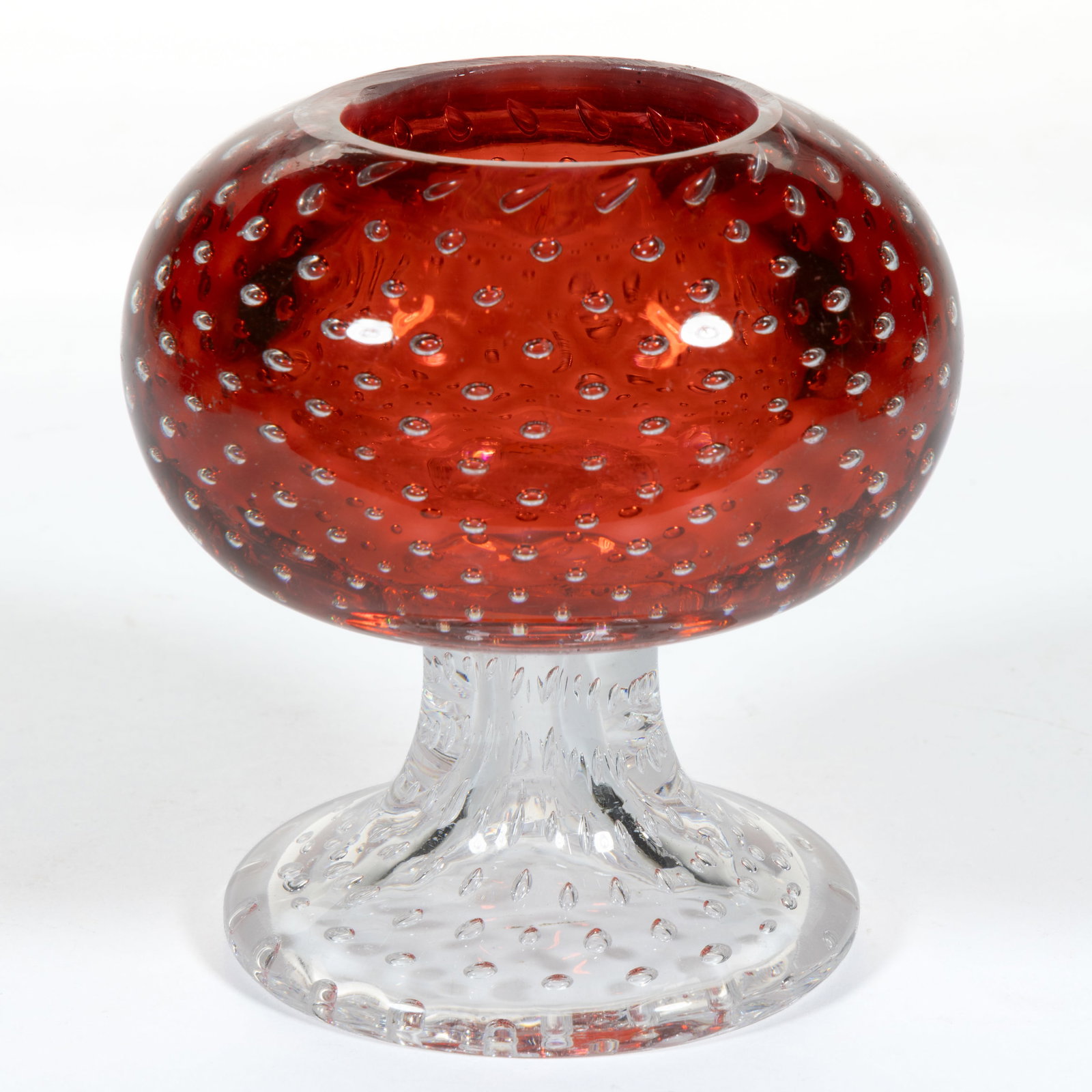 PAIRPOINT CASED CONTROLLED BUBBLE ART GLASS MASTER SALT: PAIRPOINT CASED CONTROLLED BUBBLE ART GLASS MASTER SALT, colorless with ruby casing, comprising a spherical-form bowl raised on a colorless flaring foot, factory polished rim and table ring. Prob