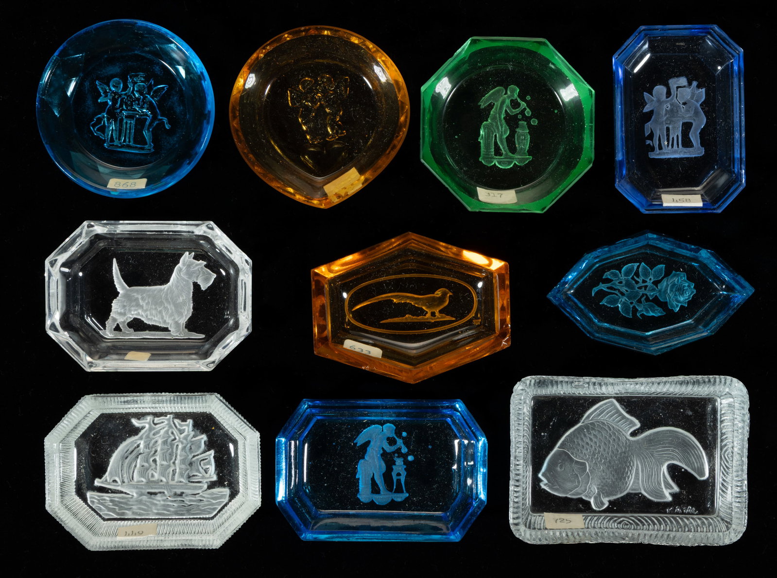 INTAGLIO GLASS OPEN SALTS, LOT OF TEN: INTAGLIO GLASS OPEN SALTS, LOT OF NINE, various colors including one apple green (reacts under black light), including one depicting a sailing/nautical scene, three featuring putti at play, one a dog,