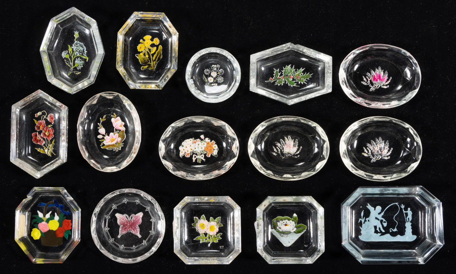 INTAGLIO GLASS OPEN SALTS, LOT OF 15: INTAGLIO GLASS OPEN SALTS, LOT OF 15, colorless with polychrome-enamel decoration, each featuring a floral motif, each having a factory-polished rim and edge. Czechoslovakia. Circa 1930. 1 3