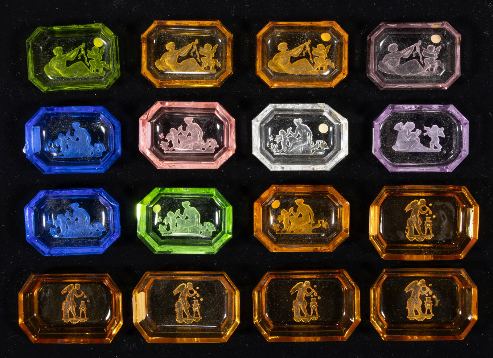 INTAGLIO GLASS OPEN SALTS, LOT OF 16: INTAGLIO GLASS OPEN SALTS, LOT OF 16, various colors, each featuring Classical figures, each having a factory-polished rim and edge. Czechoslovakia. Circa 1930. 2 3/8" to 2 5/8" DOA. Li