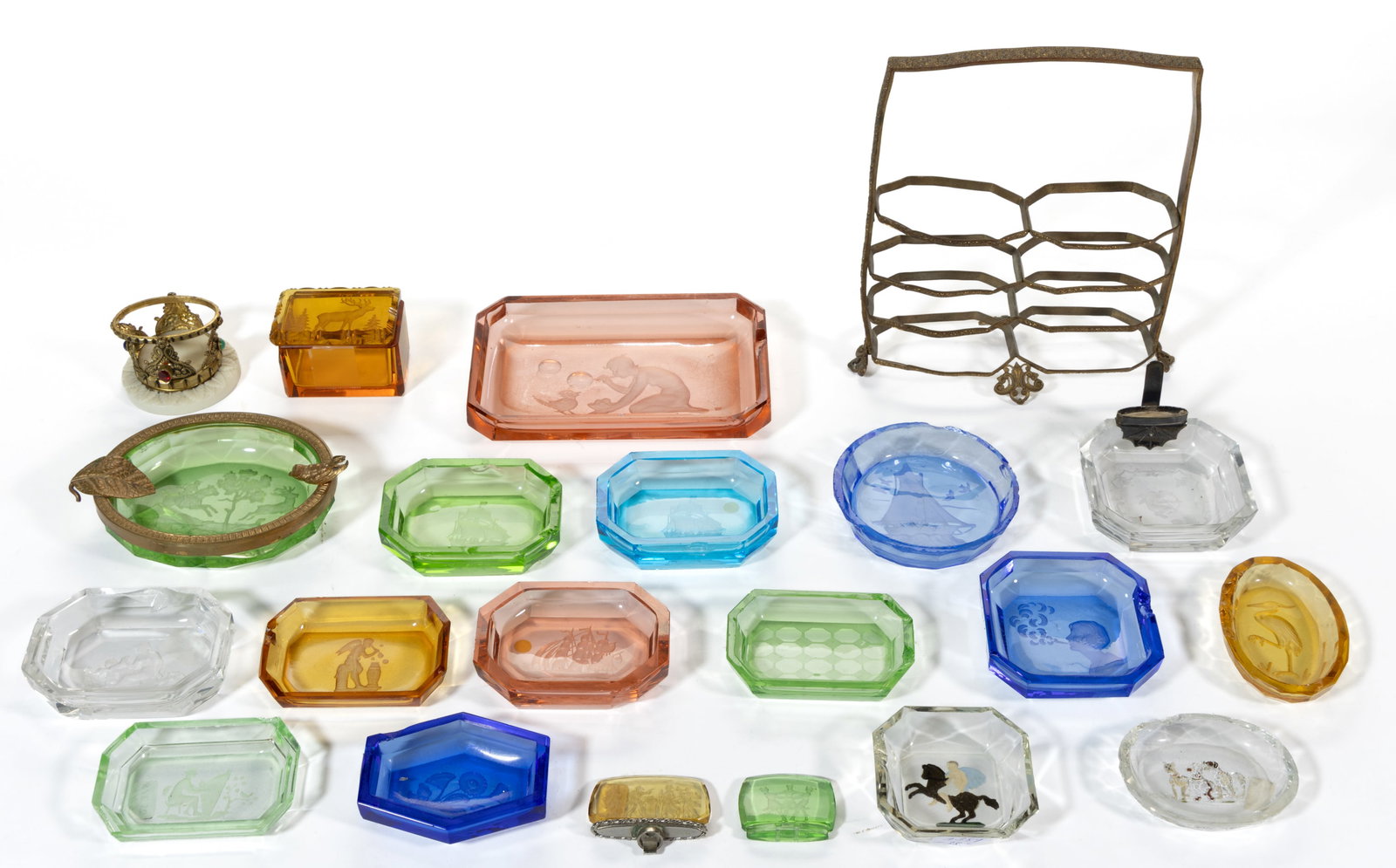 ASSORTED INTAGLIO GLASS ARTICLES, LOT OF 21: ASSORTED INTAGLIO GLASS ARTICLES, LOT OF 21, various colors, including four open salts featuring a sailing/nautical scene, four open salts featuring Classical scenes, a covered box featuring an e