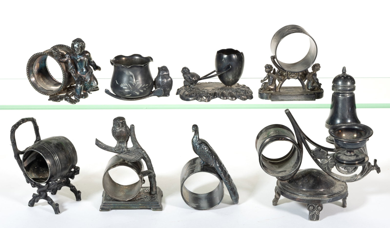 MERIDEN BRITANNIA CO. AND OTHER FIGURAL SILVER-PLATED NAPKIN RINGS AND ARTICLES, LOT OF EIGHT (1 of 1)