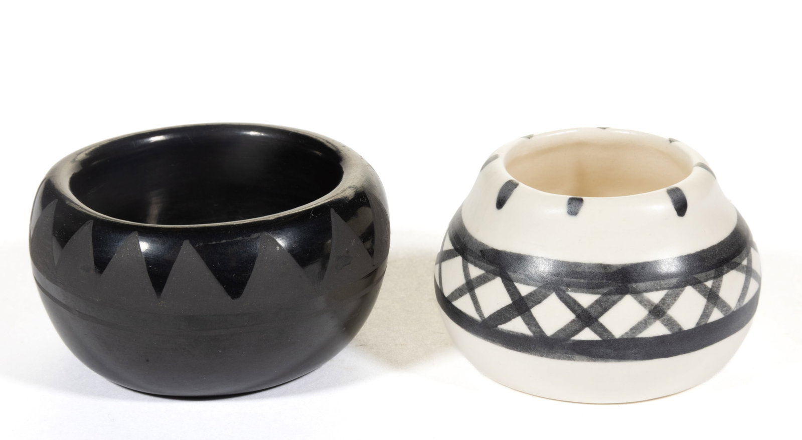 SIGNED "ANNA MERI?" NATIVE AMERICAN SANTA CLARA PUEBLO BLACKWARE POTTERY MINIATURE BOWL / OPEN SALT: SIGNED "ANNA MERI?" NATIVE AMERICAN SANTA CLARA PUEBLO BLACKWARE POTTERY MINIATURE BOWL / OPEN SALT, circular form, featuring painted triangles full round below rim. Together with a "CA