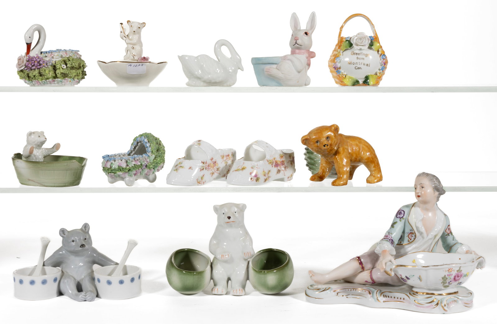 GERMAN PORCELAIN ANIMAL AND OTHER FIGURAL OPEN SALTS, LOT OF 13: GERMAN PORCELAIN ANIMAL AND OTHER FIGURAL OPEN SALTS, LOT OF 13, comprising a Voigt Brothers example depicting a reclining man behind a bowl, two Elfinware examples including a swan and a cradle, one 