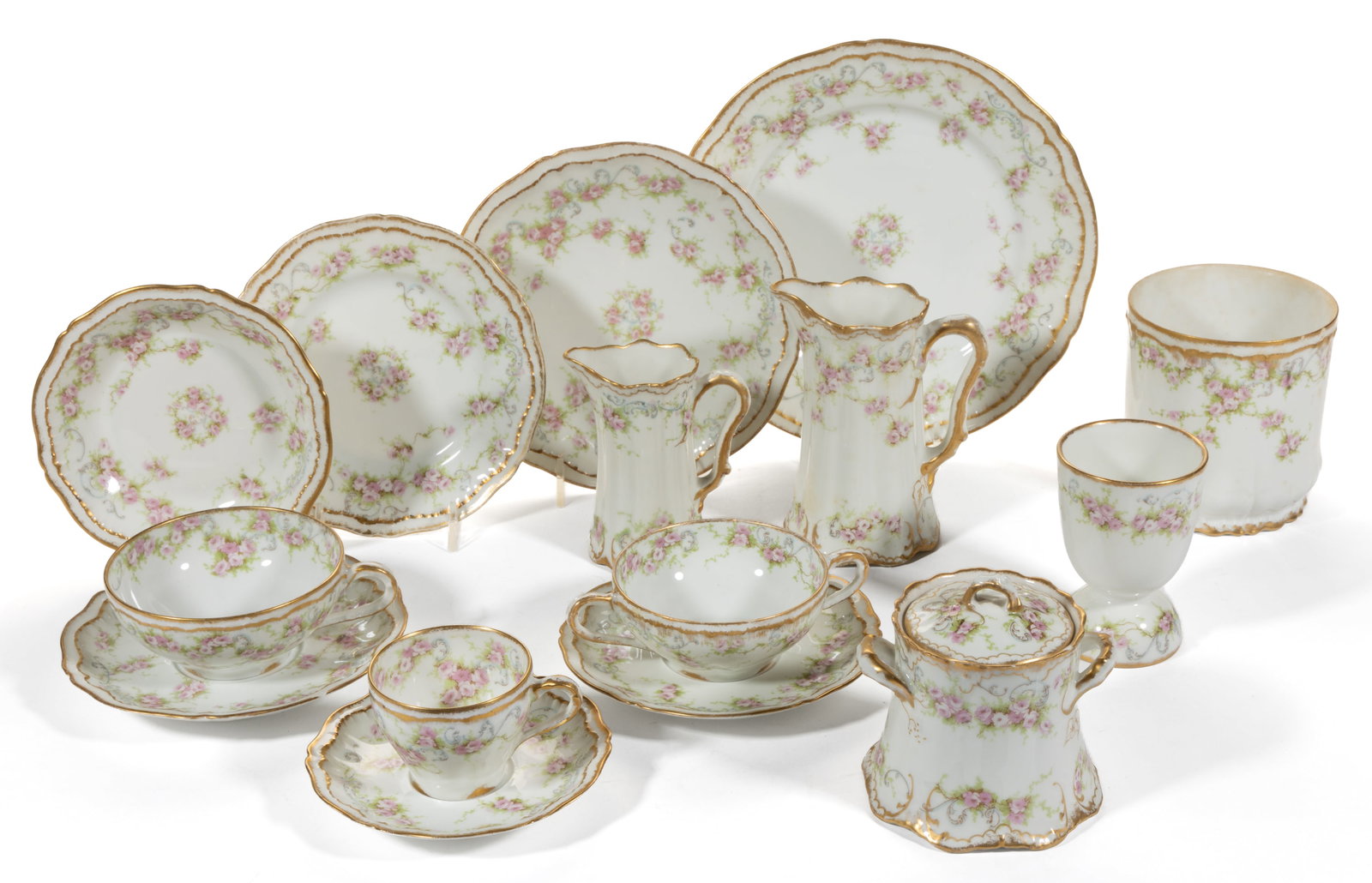 FRENCH HAVILAND LIMOGES SCHLEIGER PORCELAIN PARTIAL SET, UNCOUNTED LOT: FRENCH HAVILAND LIMOGES SCHLEIGER PORCELAIN PARTIAL SET, UNCOUNTED LOT, over 110 pieces, each having polychrome pink rose decorations with gilt accents, including six ramekin and saucer sets, three do