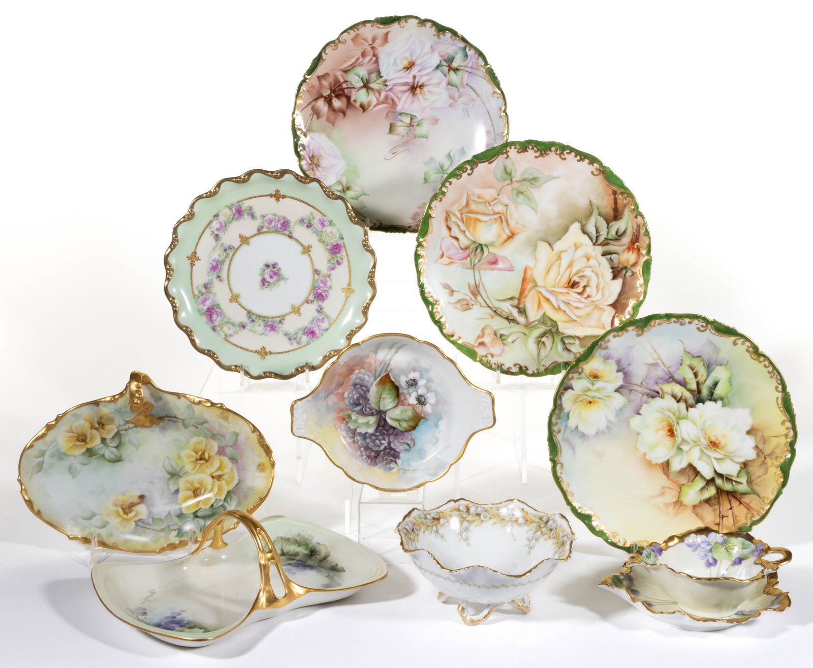 FRENCH LIMOGES PORCELAIN FLORAL / FRUIT MOTIF TABLE ARTICLES, LOT OF TEN: FRENCH LIMOGES PORCELAIN FLORAL / FRUIT MOTIF TABLE ARTICLES, LOT OF TEN, including a two-handled dish featuring polychrome hand-painted plump blackberries, signed "M. Pristerer", an ovoid-f