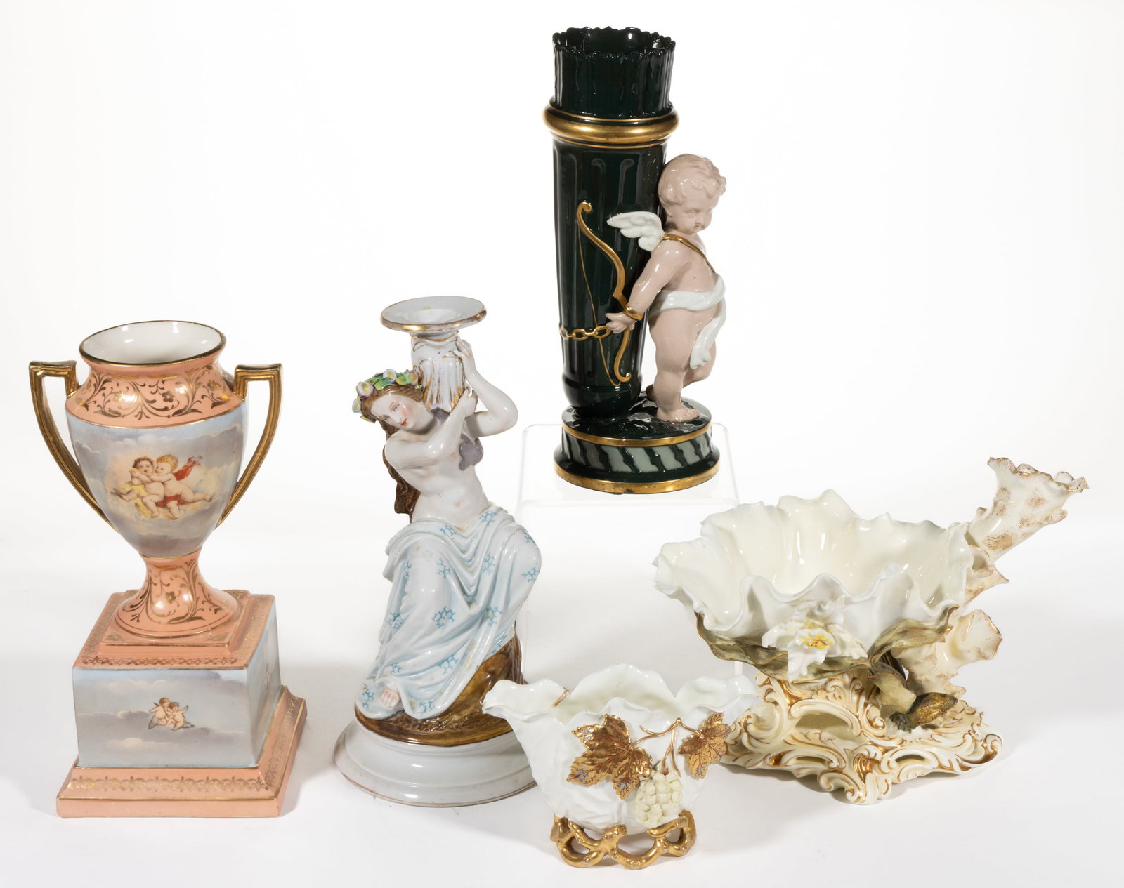 EUROPEAN PORCELAIN ARTICLES, LOT OF FIVE: EUROPEAN PORCELAIN ARTICLES, LOT OF FIVE, comprising a figural candle holder depicting a partially nude woman having long brown hair and holding a dolphin fish on her left shoulder (sconce),