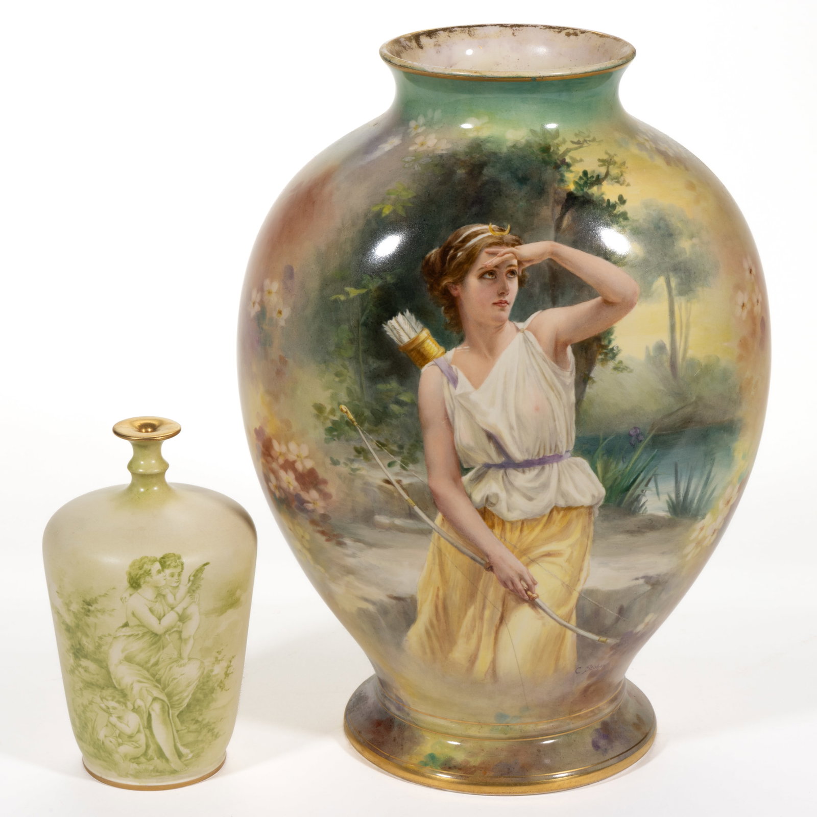 GERMAN ROYAL BONN HAND-PAINTED PORCELAIN PORTRAIT VASES, LOT OF TWO: GERMAN ROYAL BONN PORCELAIN HAND-PAINTED PORTRAIT VASES, LOT OF TWO, comprising one polychrome-decorated example depicting a gazing Diana the Huntress on one side, wearing a shear top, holding he