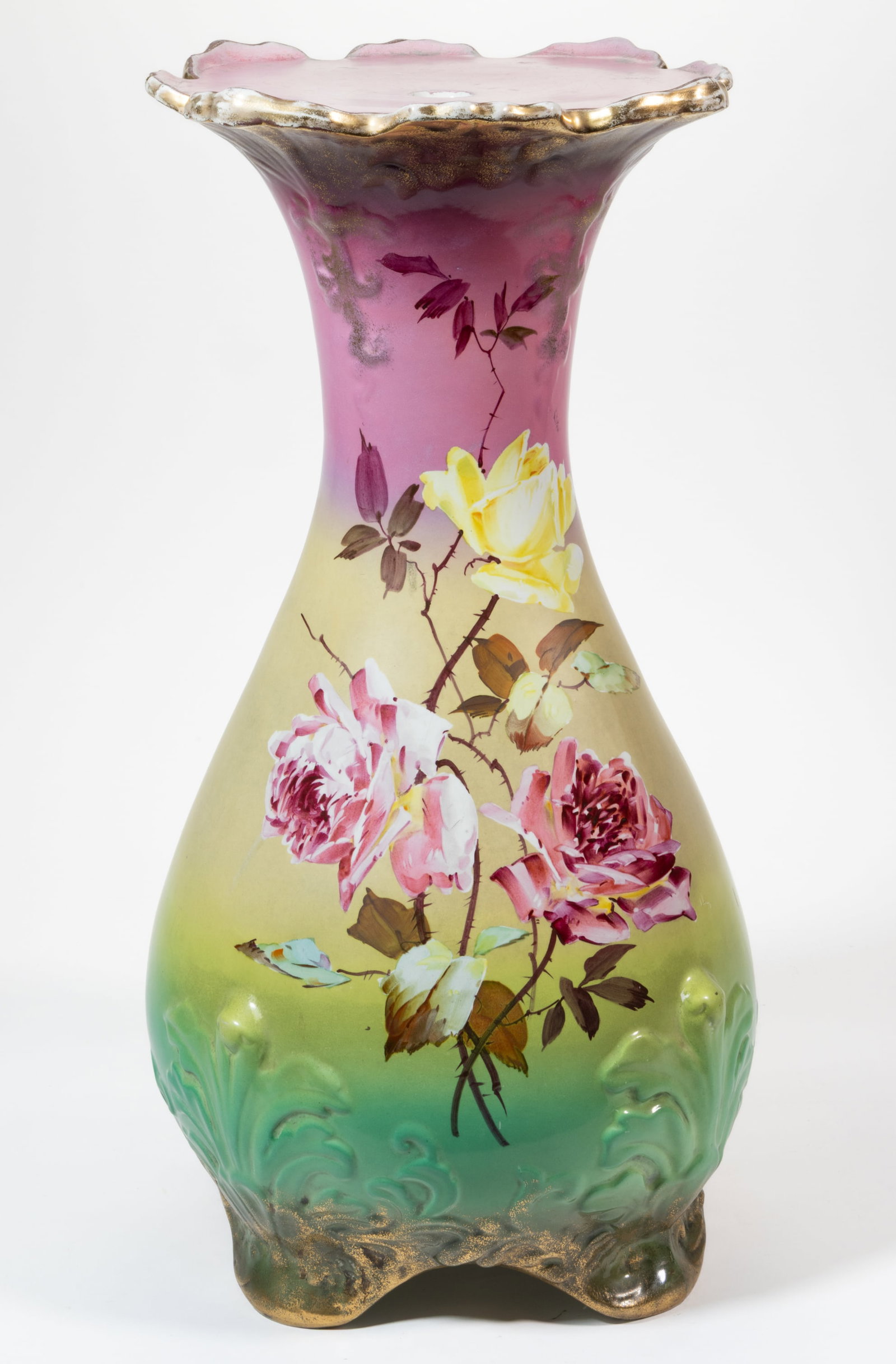 CONTINENTAL HAND-PAINTED FLORAL MOTIF CERAMIC PEDESTAL / STAND: CONTINENTAL HAND-PAINTED FLORAL MOTIF CERAMIC PEDESTAL / STAND, baluster form, featuring a bold polychrome rose motif to each side on pink, yellow, and green ground gilt accents. Late 19th/early 