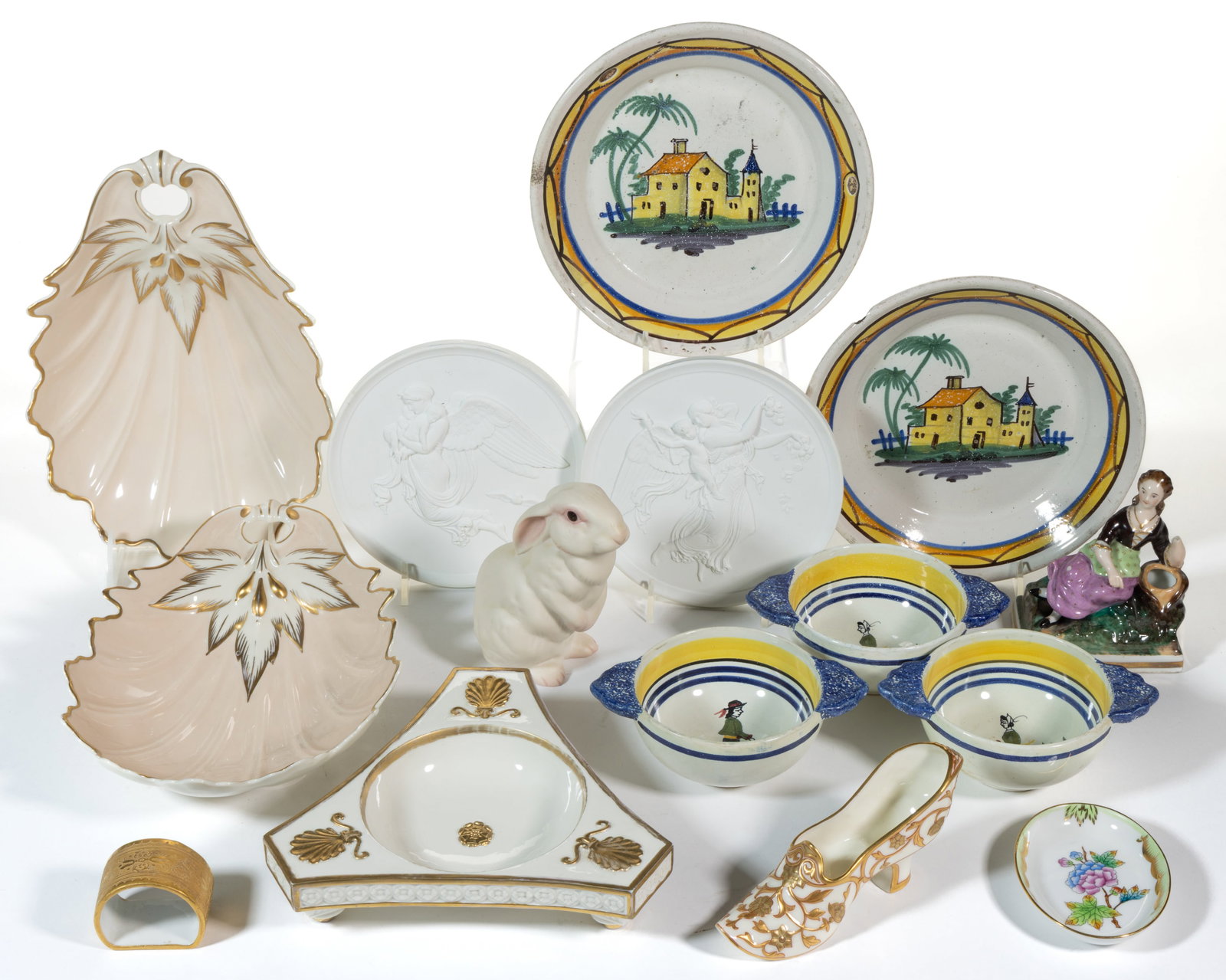 ASSORTED CERAMIC ARTICLES, LOT OF 15: ASSORTED CERAMIC ARTICLES, LOT OF 15, including two 7 3/4" D French faience plates depicting a yellow house with fence and tall palm trees, one tri-footed Mottahedeh dish with embossed 