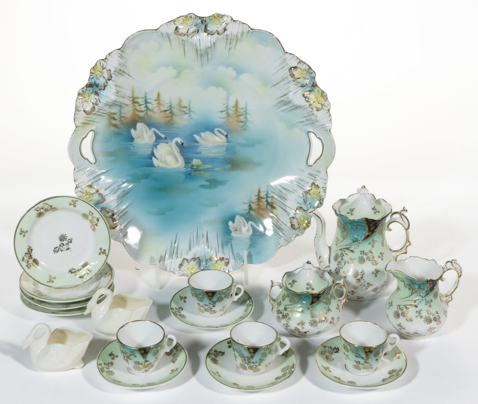 R.S. PRUSSIA PORCELAIN AND OTHER ARTICLES, LOT OF 18: R.S. PRUSSIA PORCELAIN AND OTHER ARTICLES, LOT OF 18, comprising an 11-piece children's tea set having gilt-printed sprig decorations and consisting of a teapot, a creamer, a covered sugar, f