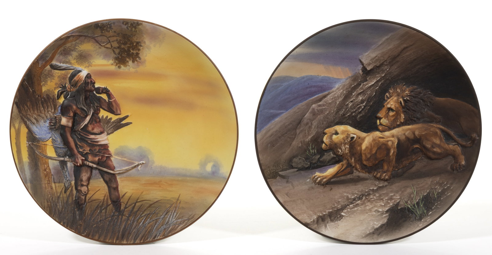 JAPANESE NIPPON PORCELAIN BLOWN OUT PLAQUES, LOT OF TWO: JAPANESE NIPPON PORCELAIN BLOWN OUT PLAQUES, LOT OF TWO, each having polychrome hand-painted embossed scenes, comprising one depicting an indigenous Native American man standing in still water, holdin